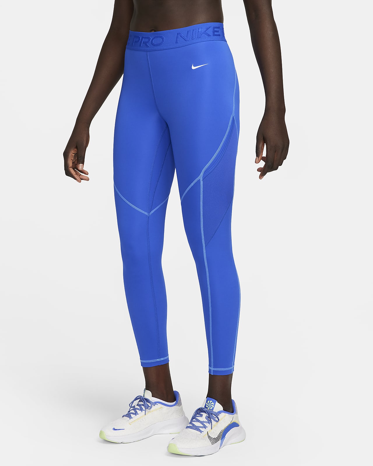 Nike Pro 7/8-leggings med mellemhøj talje og lommer til kvinder