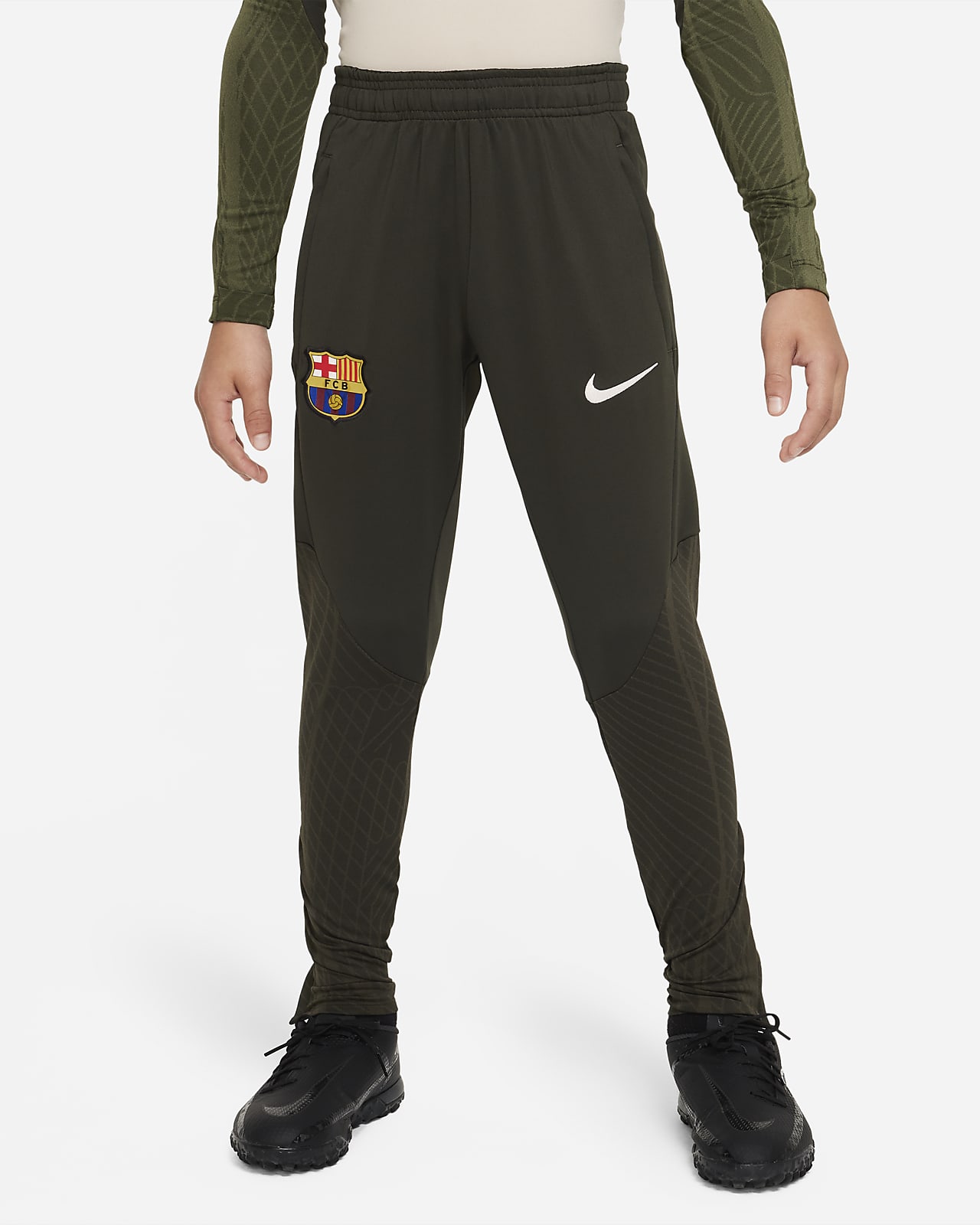 Pleteninové fotbalové kalhoty Nike Dri-FIT FC Barcelona Strike pro větší děti