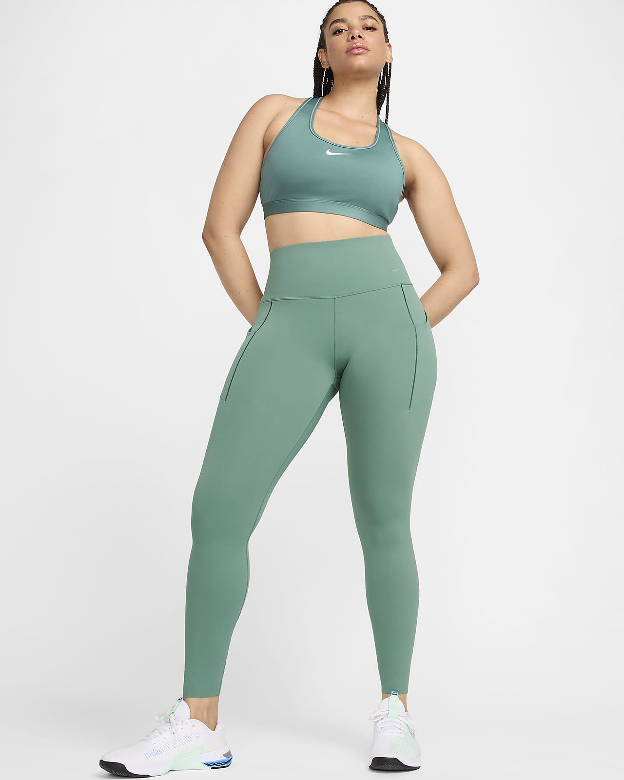 Nike Universa-leggings i fuld længde med medium støtte, høj talje og lommer til kvinder