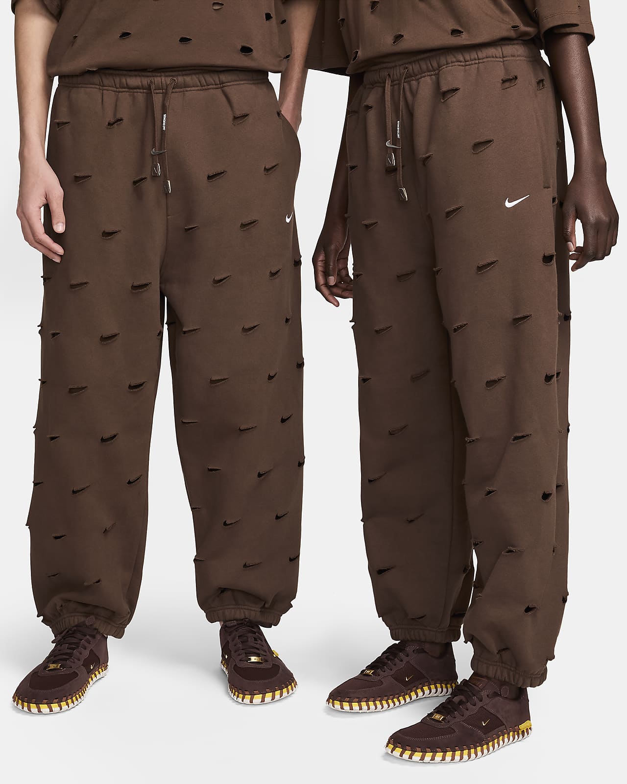 Kalhoty Nike x Jacquemus s logem Swoosh