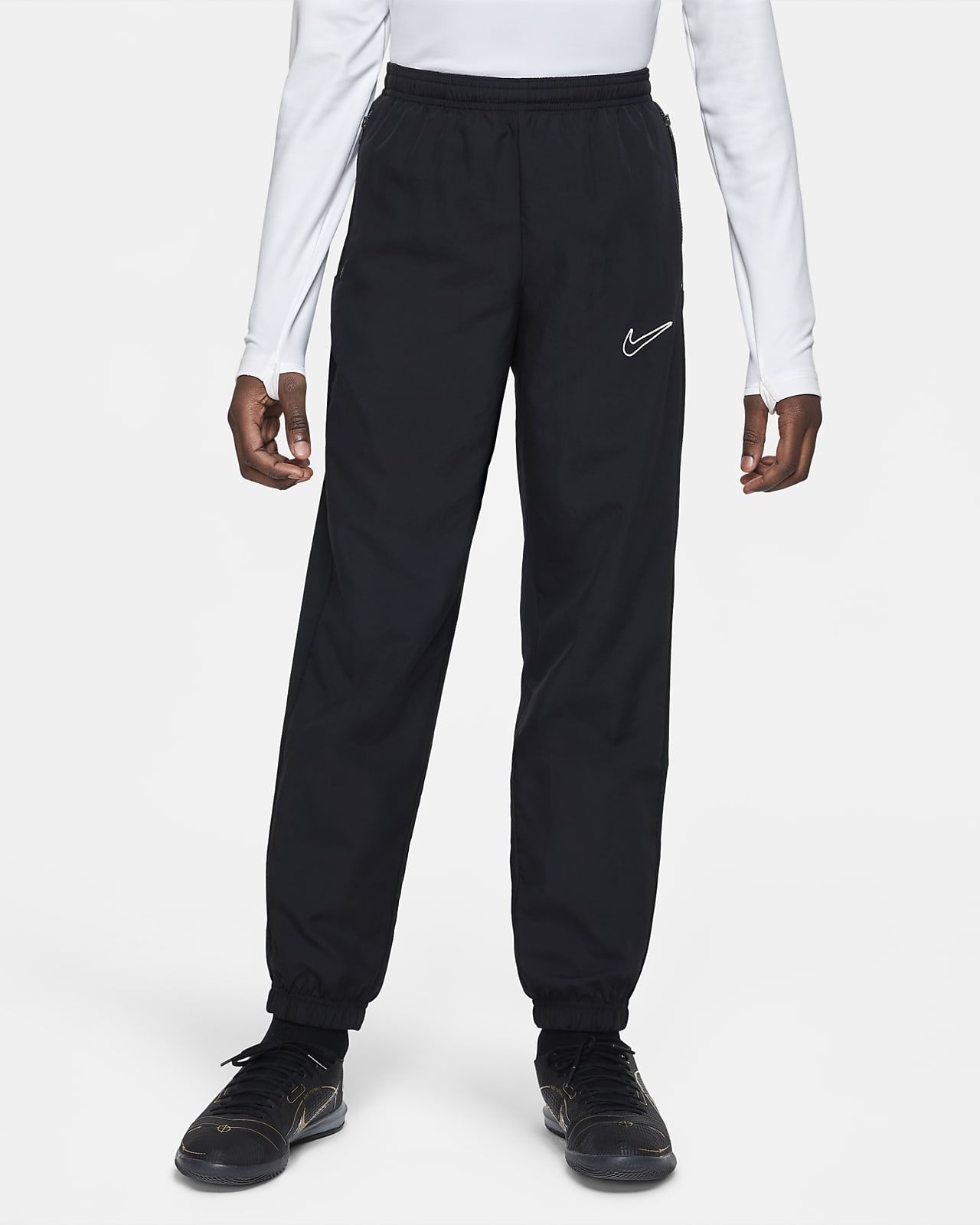 Nike Dri-FIT Academy Older Kids' Woven Football Tracksuit Bottoms (Stock)