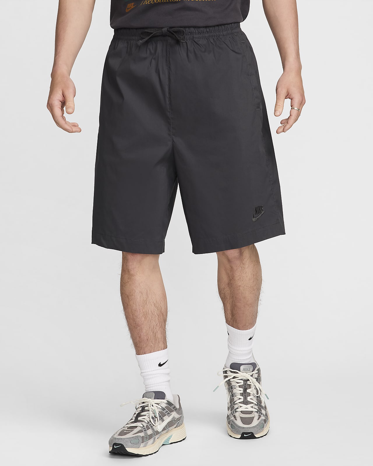 กางเกงขาสั้นแบบทอผู้ชายขนาดโอเวอร์ไซส์ Nike Sportswear