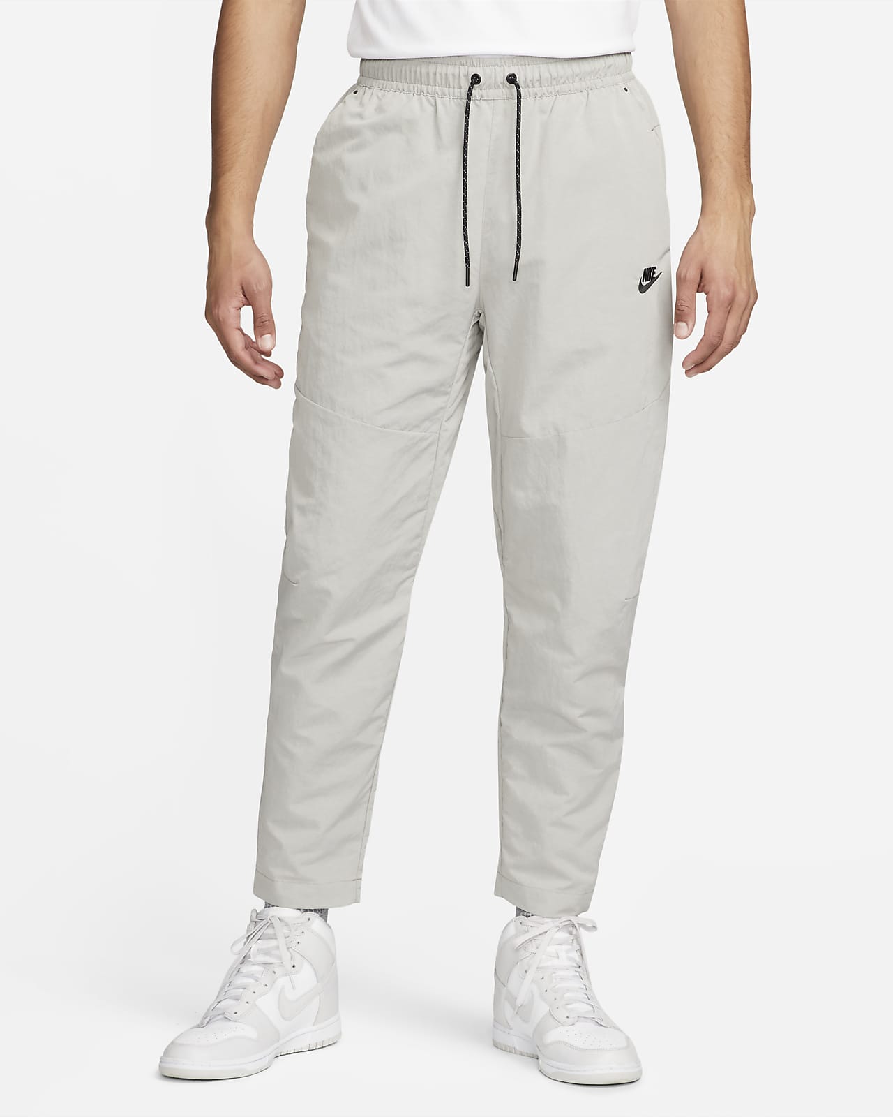 Nike Sportswear Tech Essentials Men's Lined Commuter Trousers. Nike LU