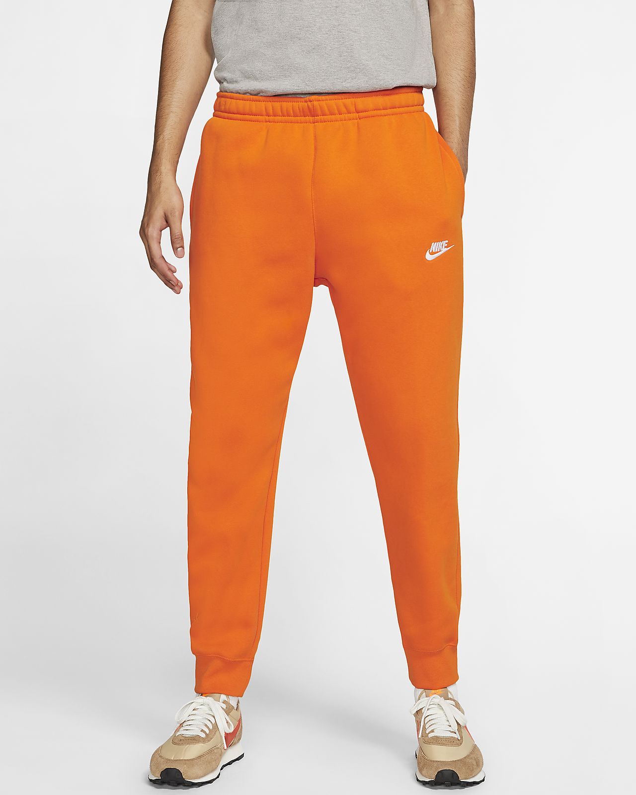 orange and black nike joggers
