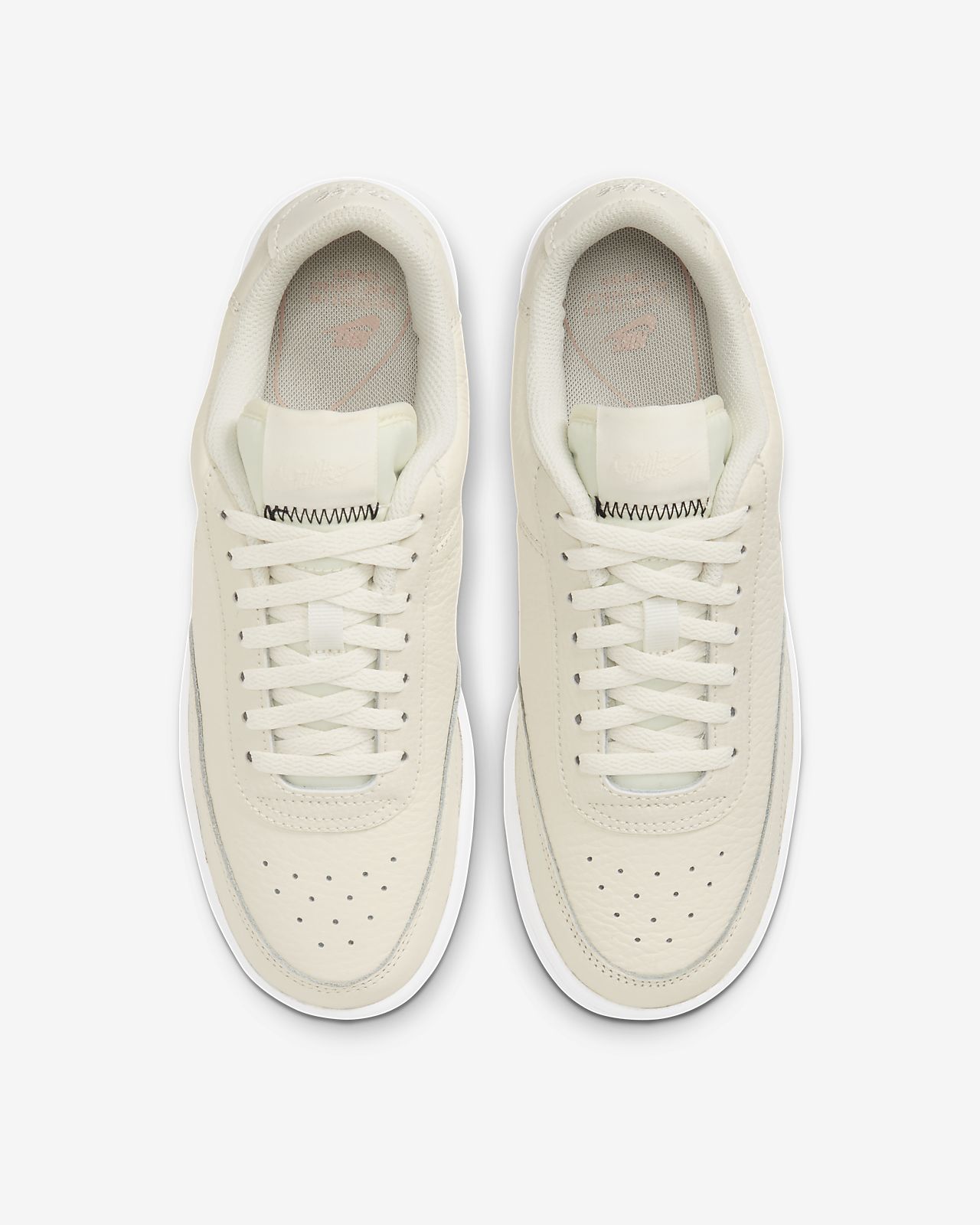 nike court vintage trainers in cream