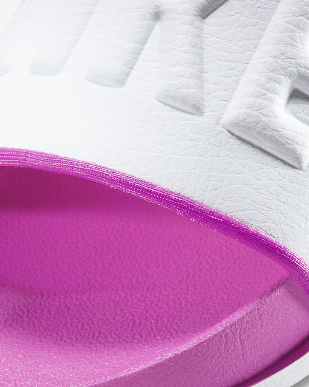 pink and purple nike slides