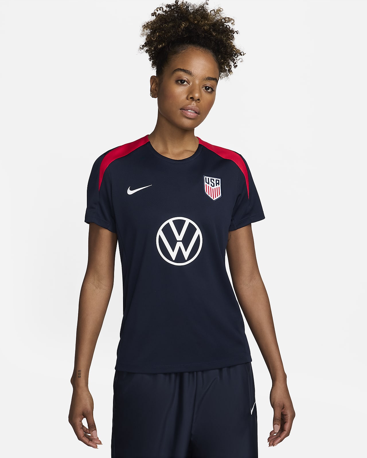 Playera de fútbol de manga corta de tejido Knit Nike Dri-FIT de la selección nacional masculina de Estados Unidos Strike para mujer