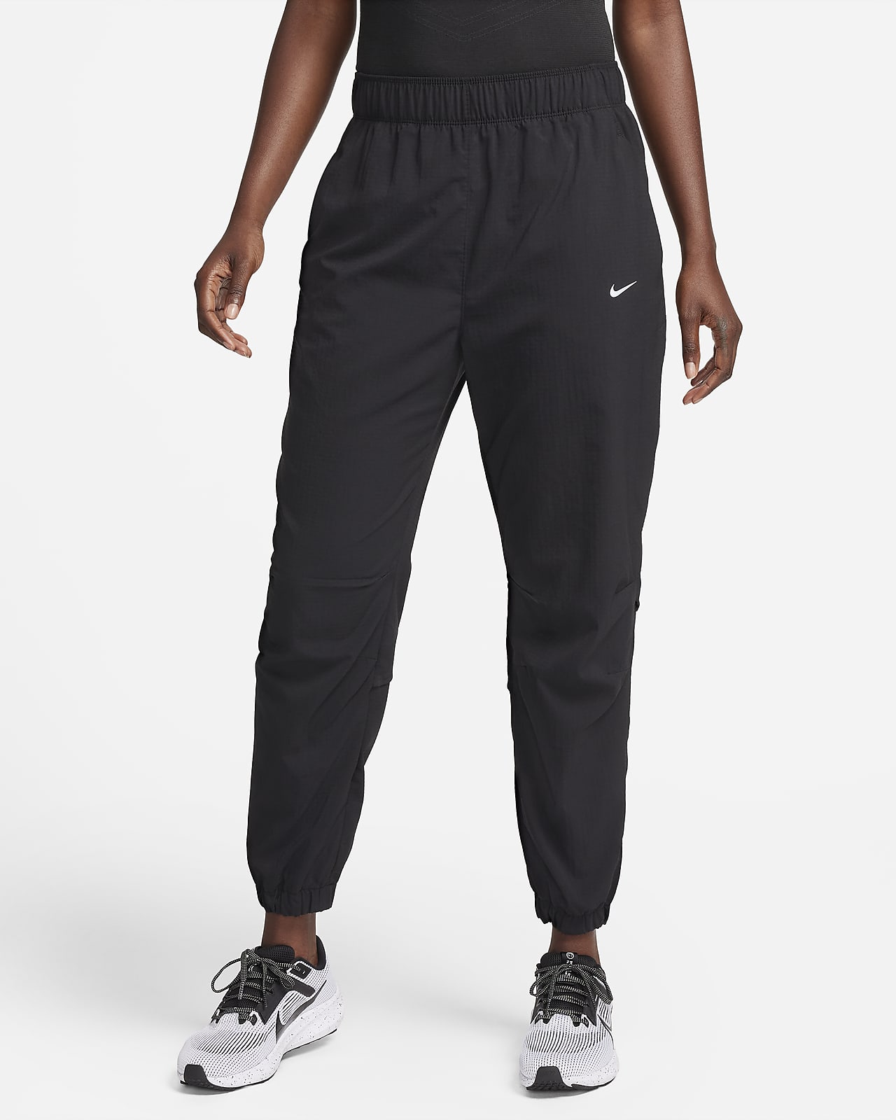 Dámské 7/8 běžecké kalhoty Nike Dri-FIT Fast se středně vysokým pasem na rozcvičkum