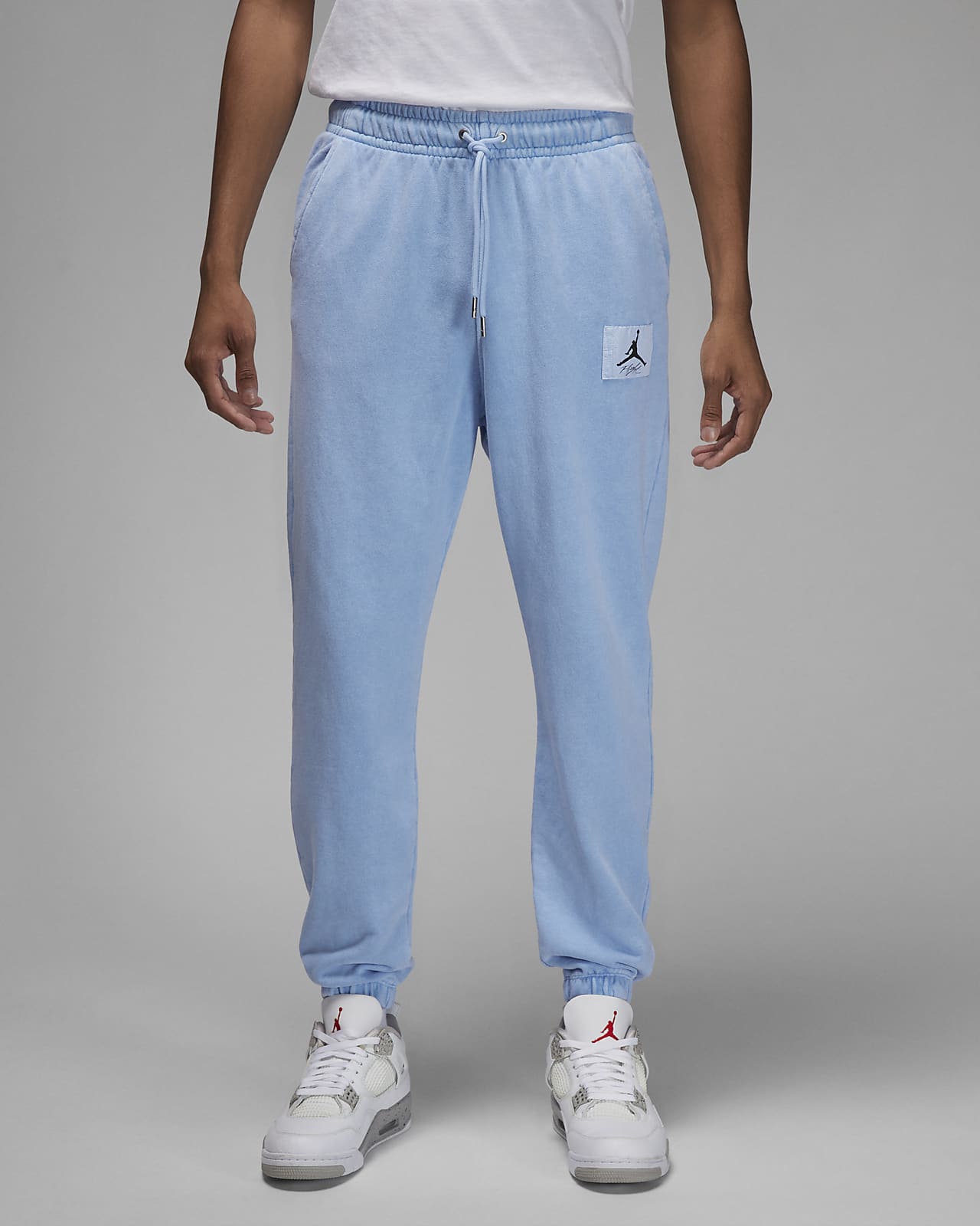 Jordan Essentials Men's Fleece Washed Trousers. Nike HR