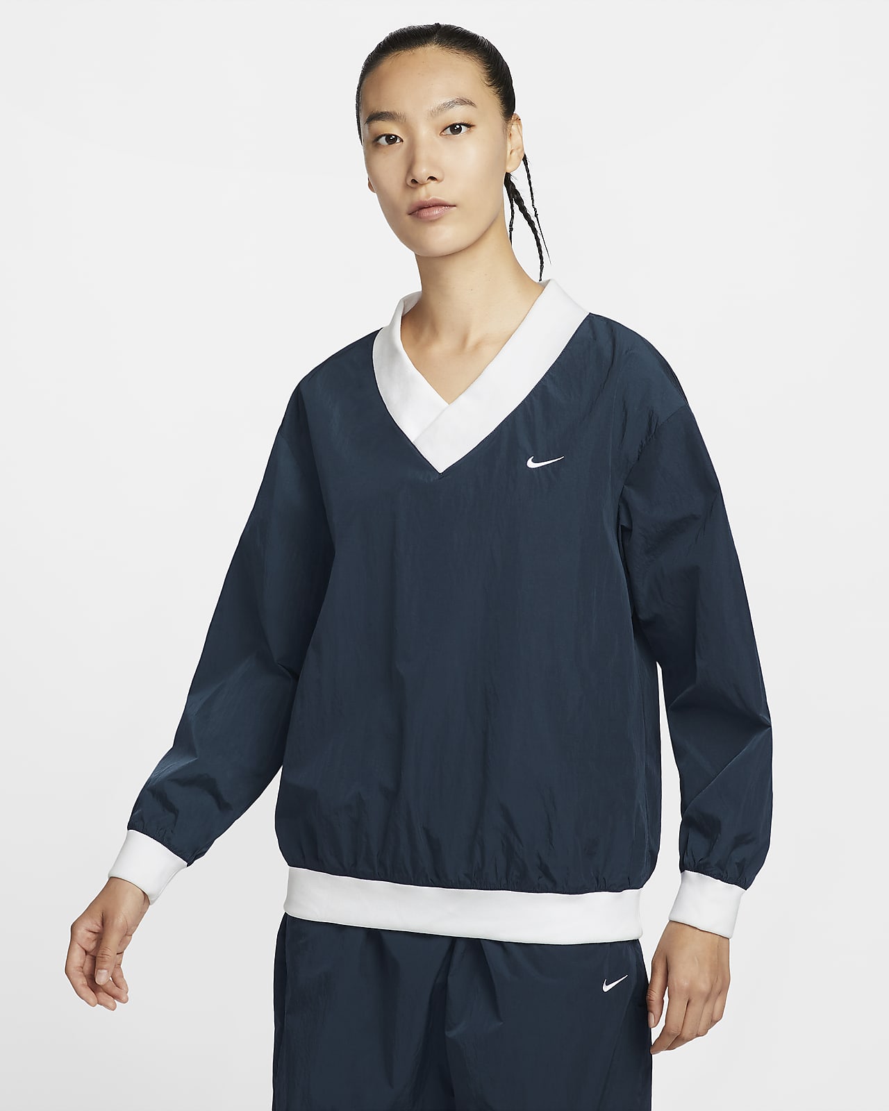Nike Sportswear Essential Women's Loose UV Woven Long-Sleeve V-Neck Top