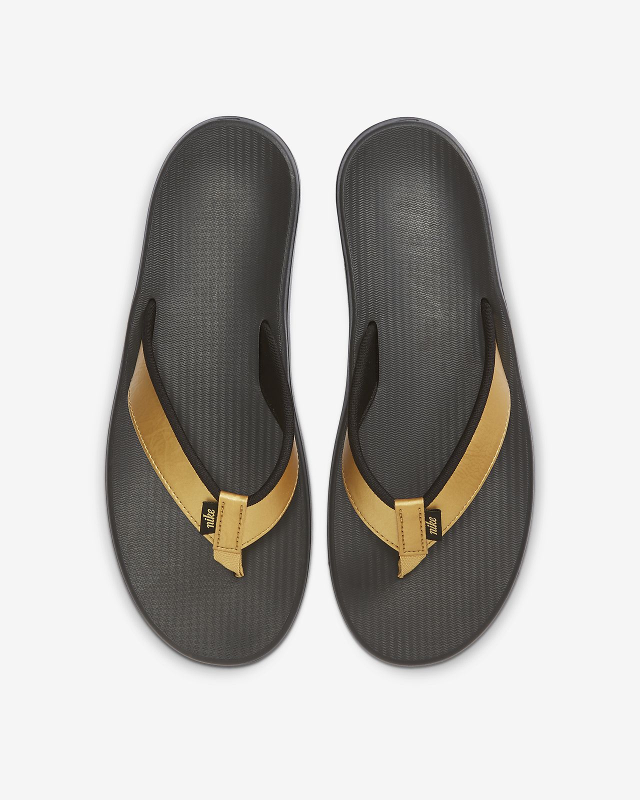 tan nike flip flops