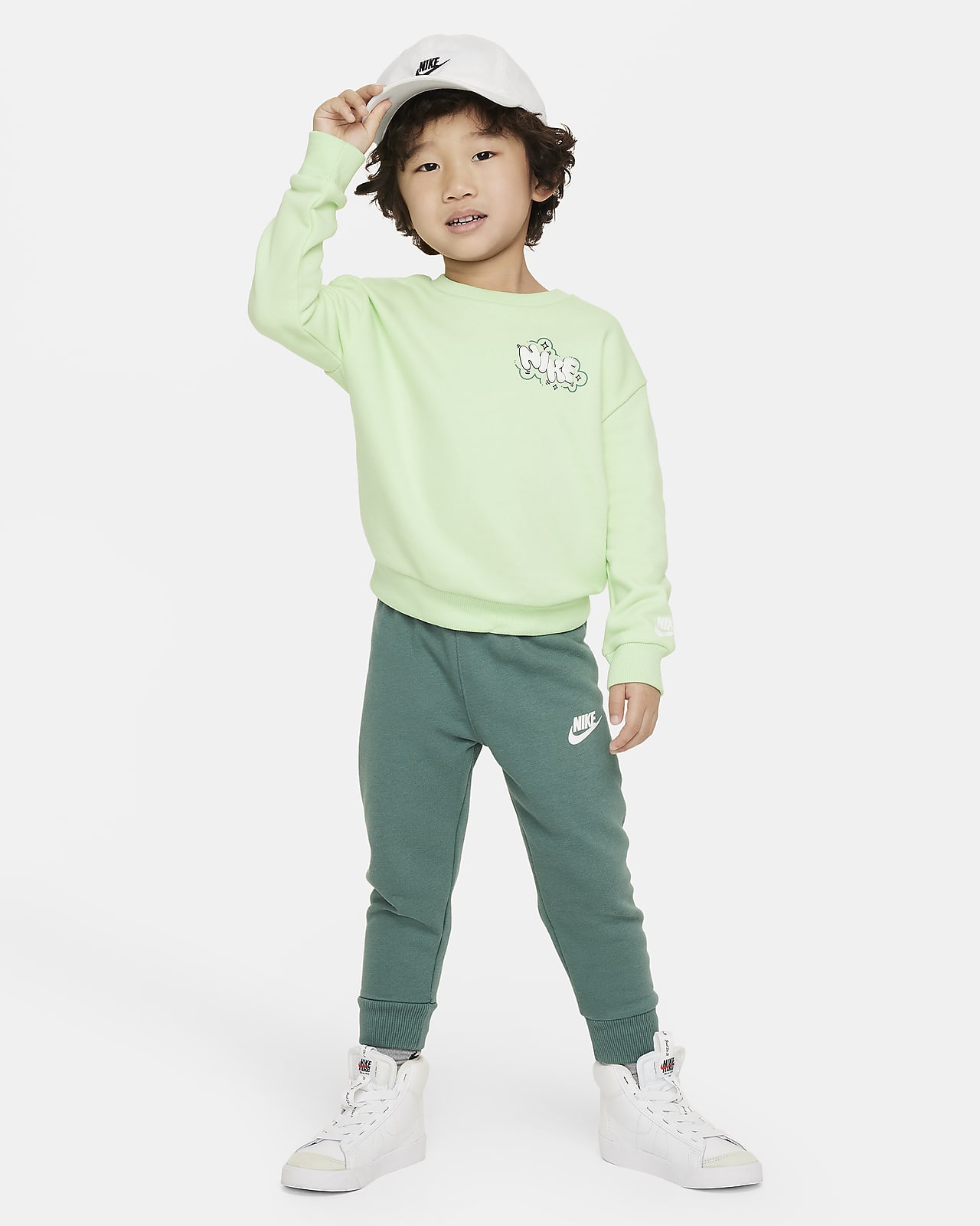 Conjunto de sudadera de cuello redondo de French Terry estampada infantil Nike Sportswear Create Your Own Adventure