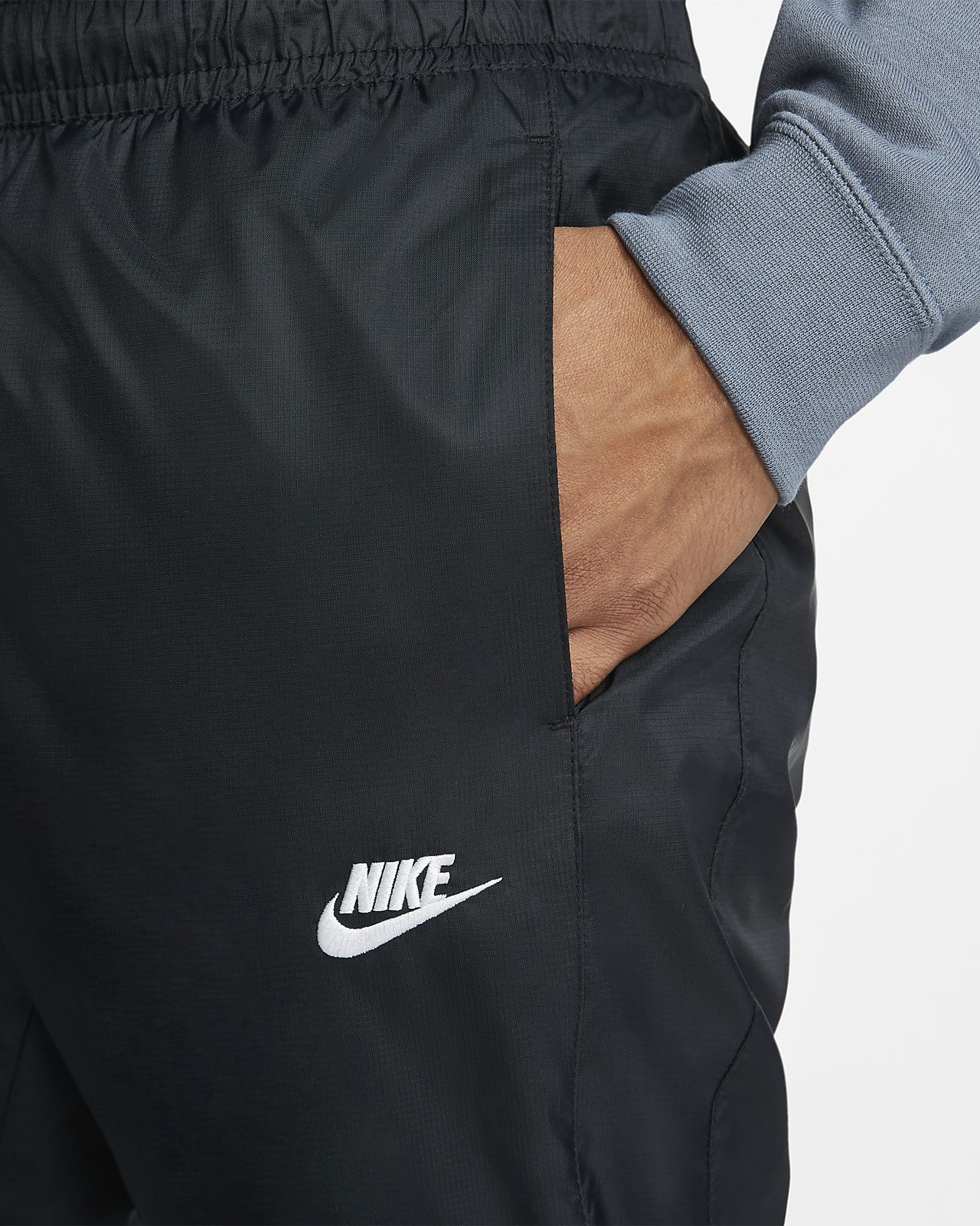 nike track pants shorts