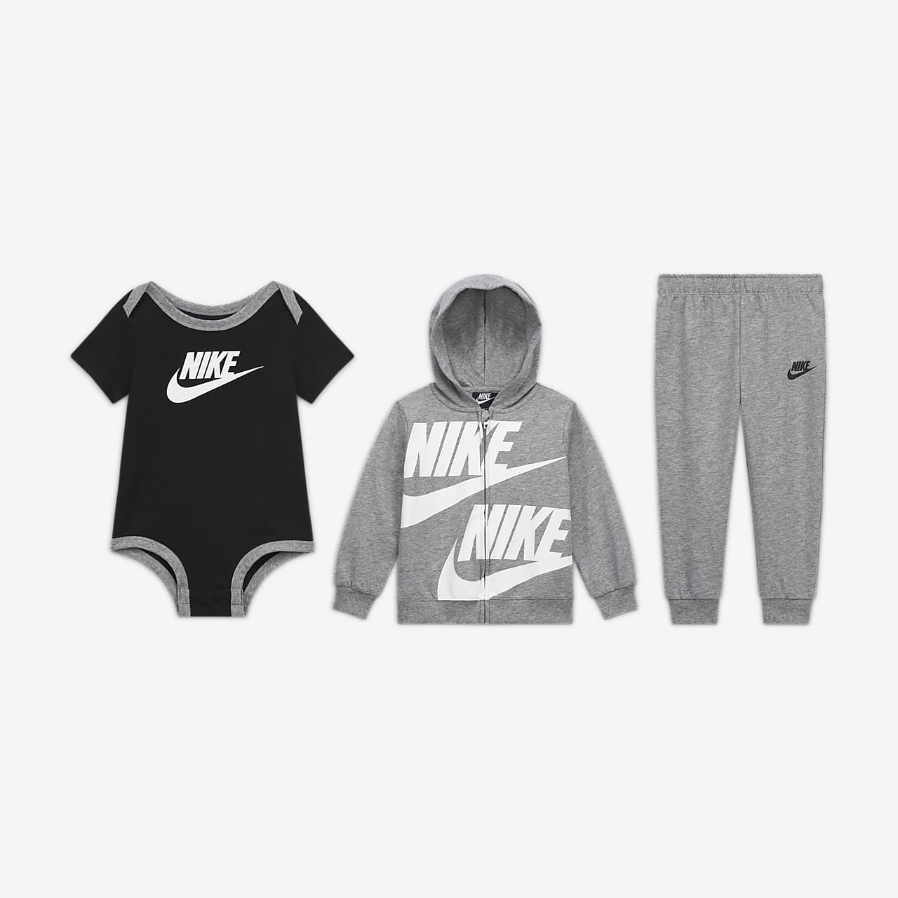 película promedio ven Conjunto de body, sudadera con capucha y pantalones para bebé Nike (de 12 a  24 meses). Nike.com