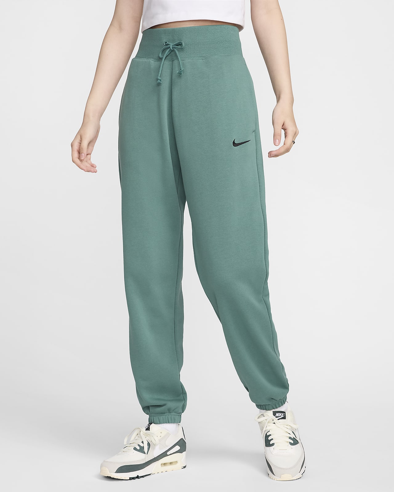 กางเกงซ้อมกีฬาผ้าเฟรนช์เทรีเอวสูงขนาดโอเวอร์ไซส์ผู้หญิง Nike Sportswear Phoenix Fleece