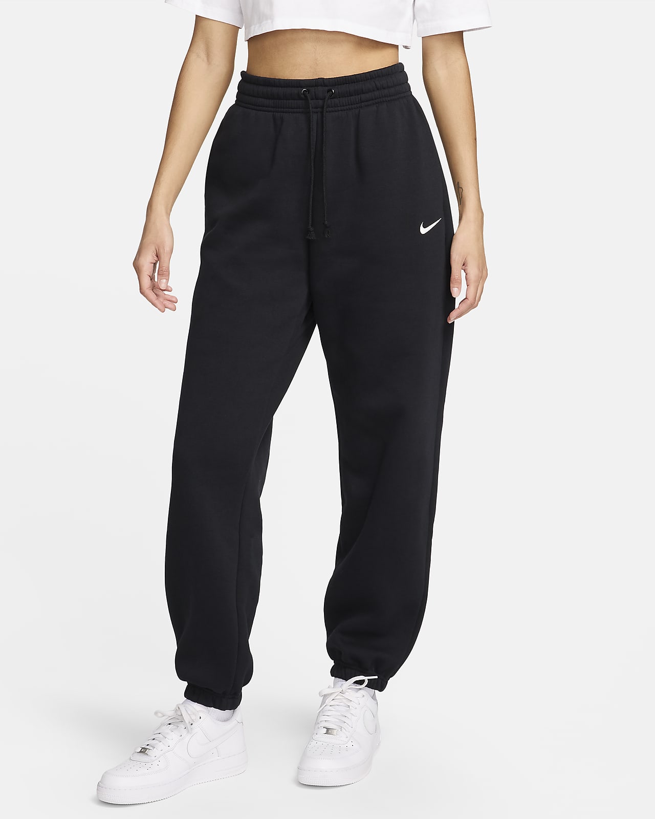 Calças de fato de treino folgadas de cintura subida Nike Sportswear Phoenix Fleece para mulher