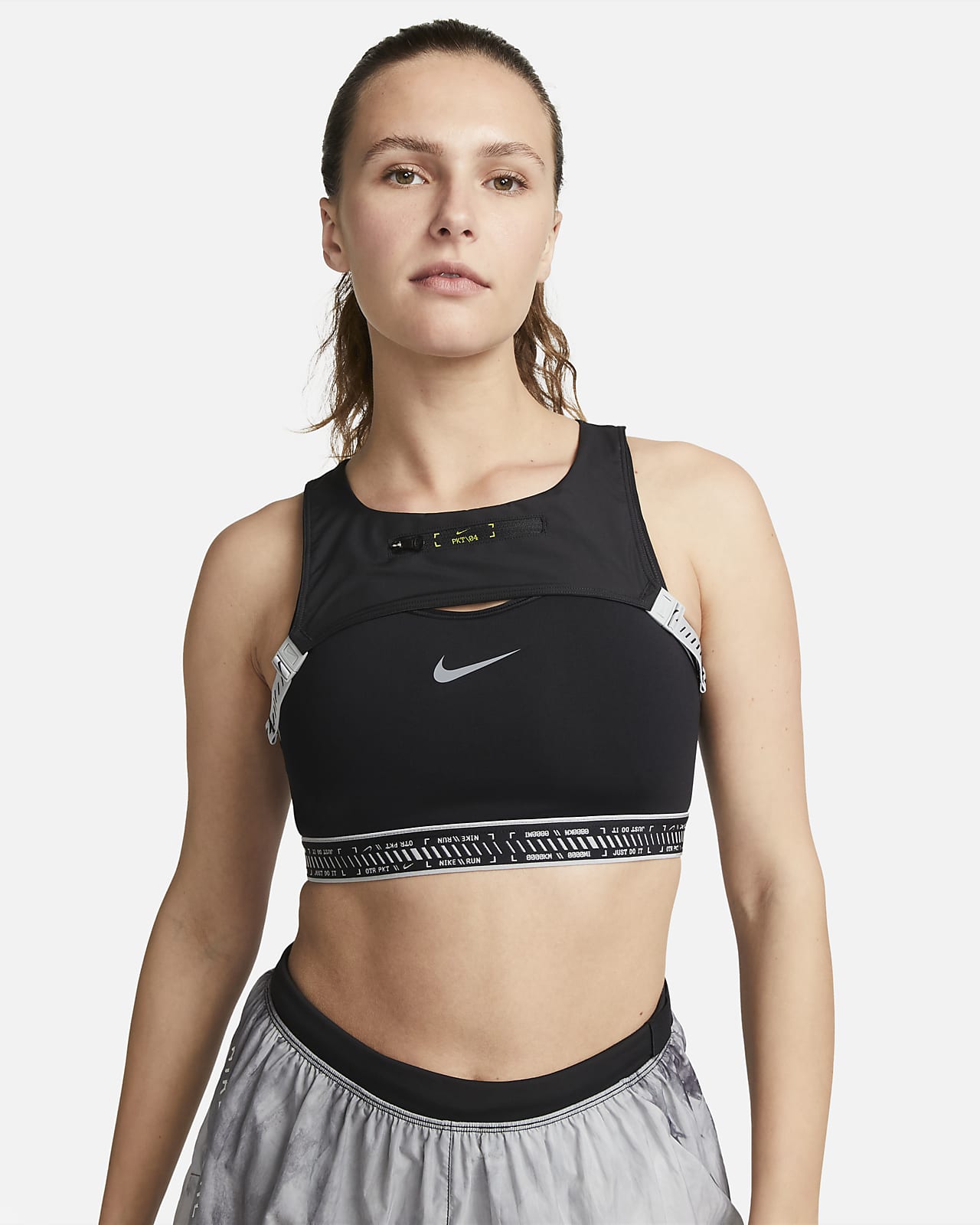 Nike Swoosh On The Run Sujetador deportivo de sujeción media con forro ligero y bolsillo - Mujer