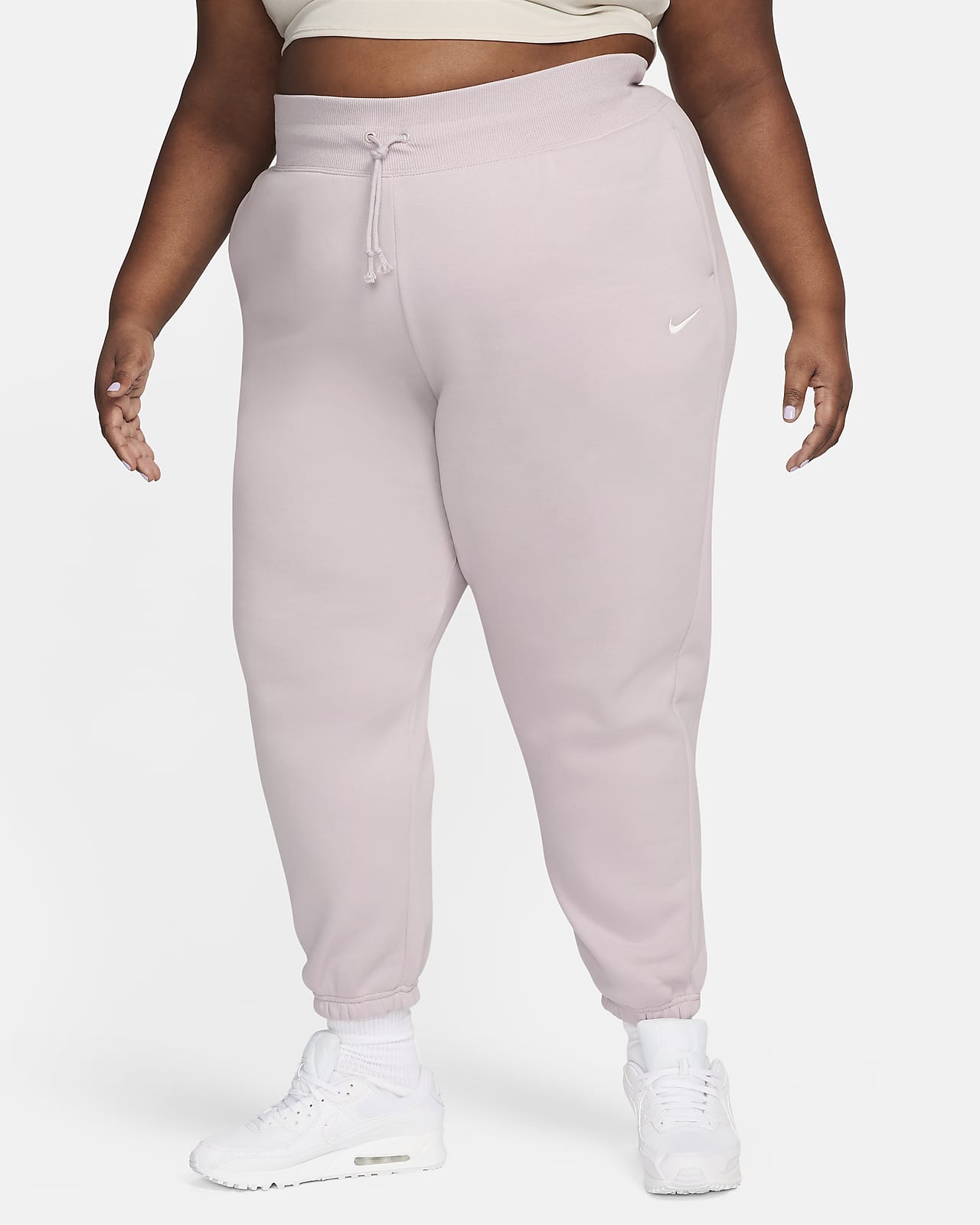 Calças de fato de treino folgadas de cintura subida Nike Sportswear Phoenix Fleece para mulher (tamanhos grandes)