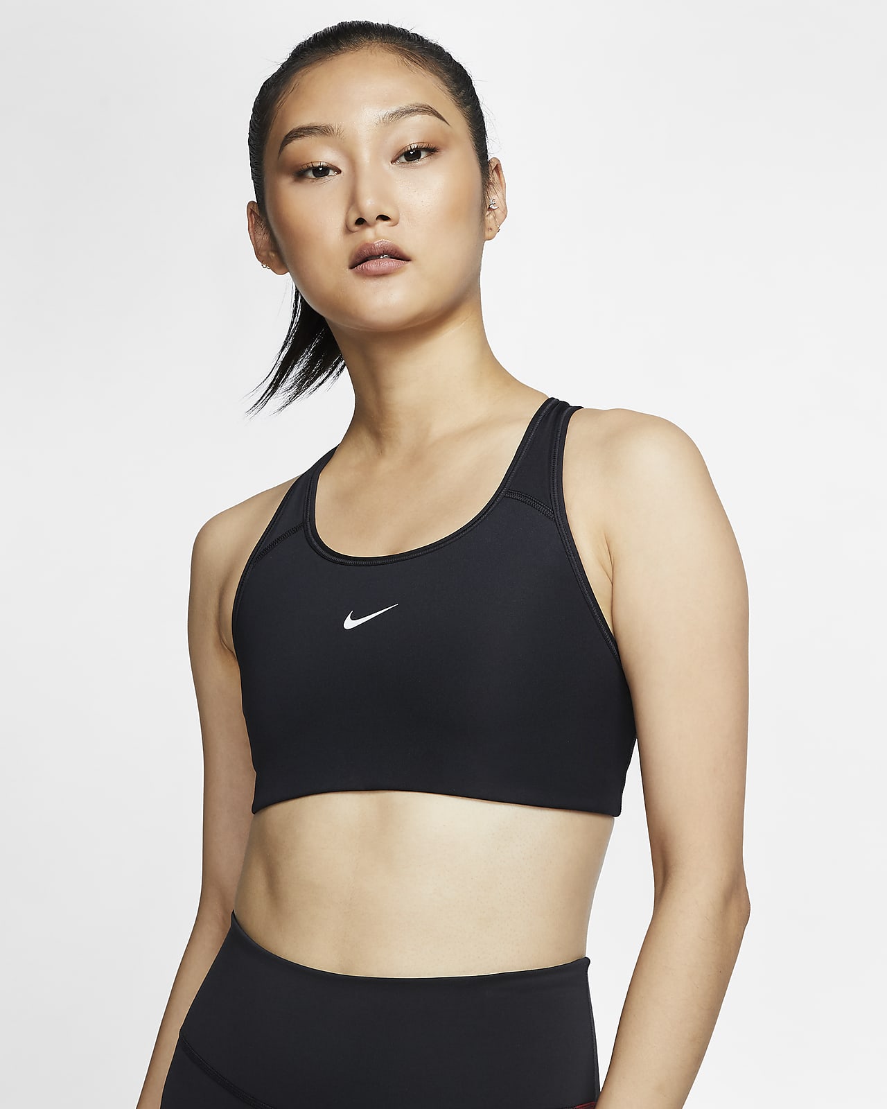 Nike Dri-FIT Swoosh sports-BH med innlegg i én del og middels støtte til dame