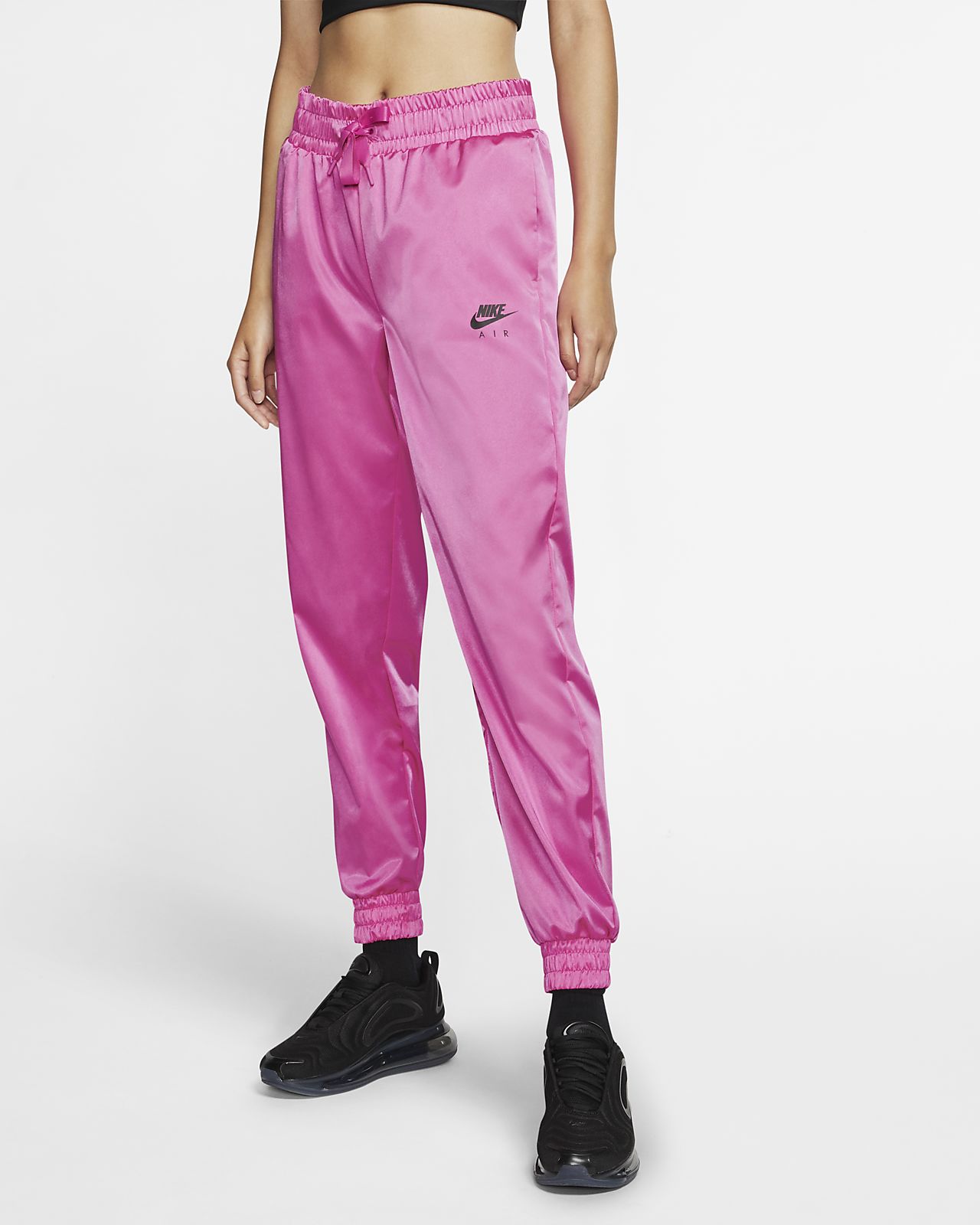 black pink and blue nike tracksuit