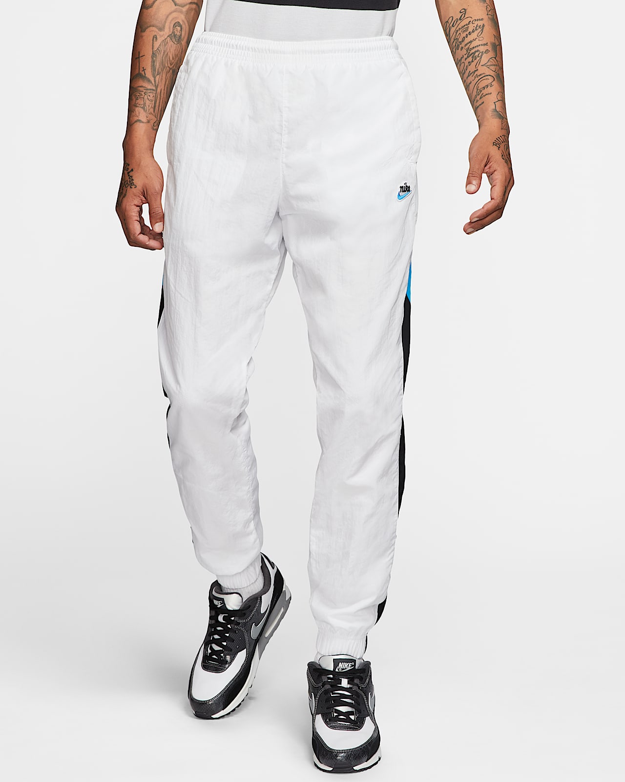 nike pantalon de survêtement tissé swoosh homme nike pantalon de survêtement tissé swoosh homme