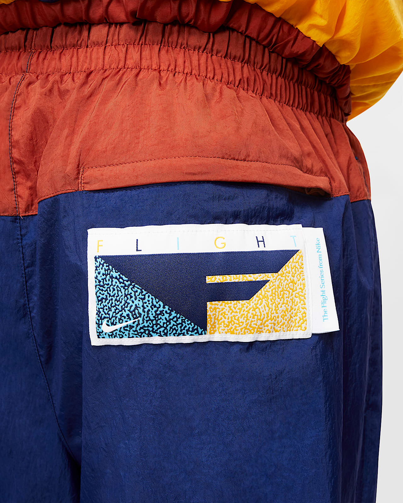 blue and orange nike tracksuit