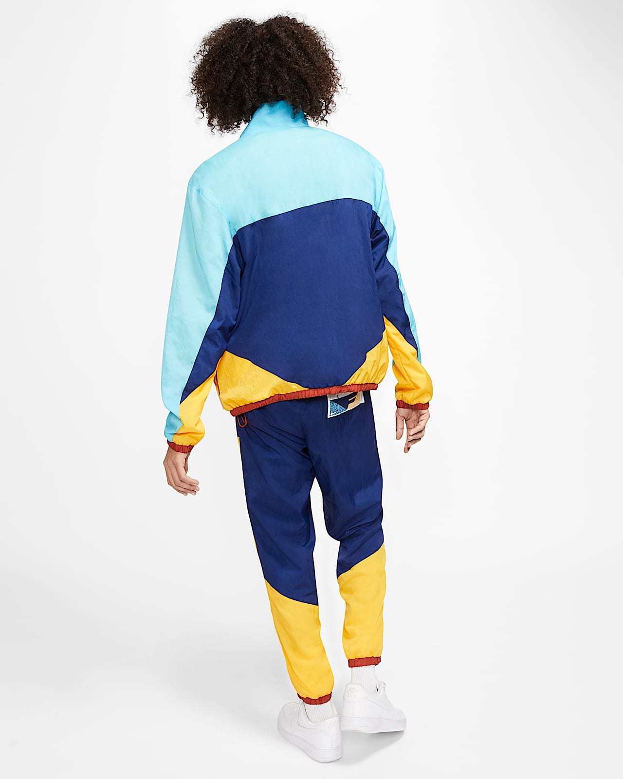 blue and yellow nike tracksuit