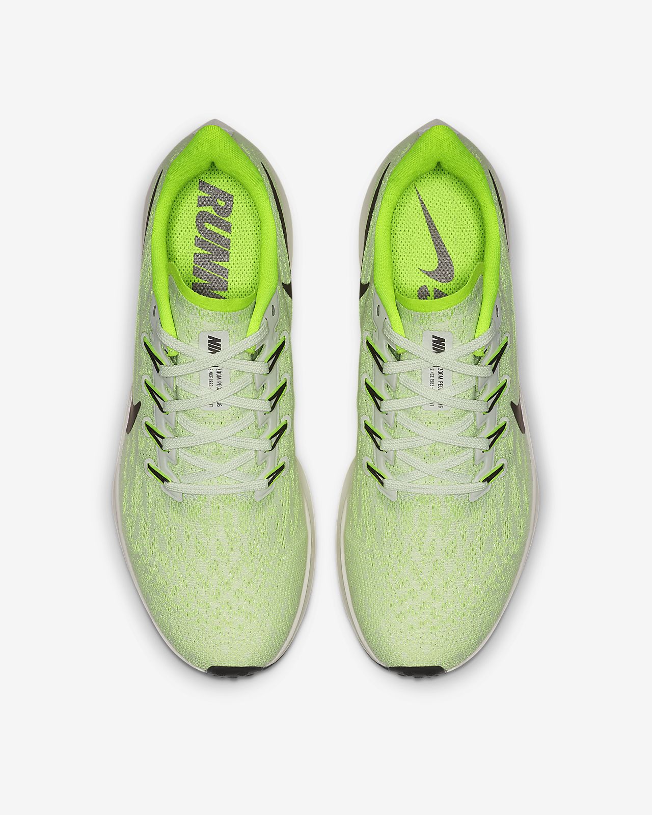 nike running air zoom pegasus 36 in green and white