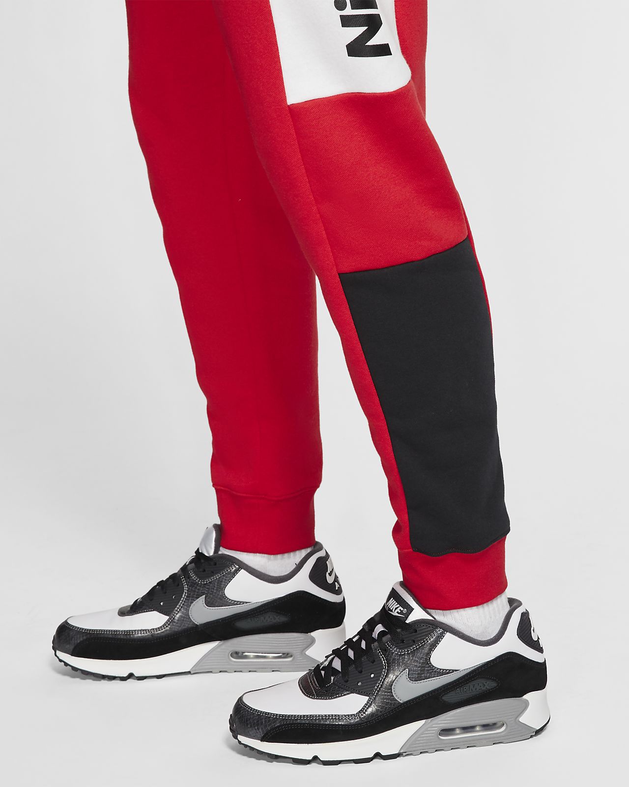 red and white nike joggers