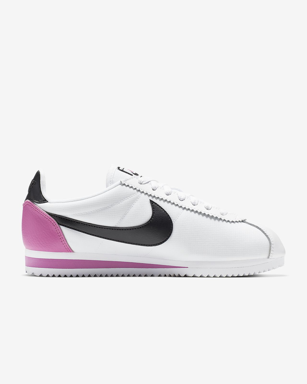 pink and white nike cortez