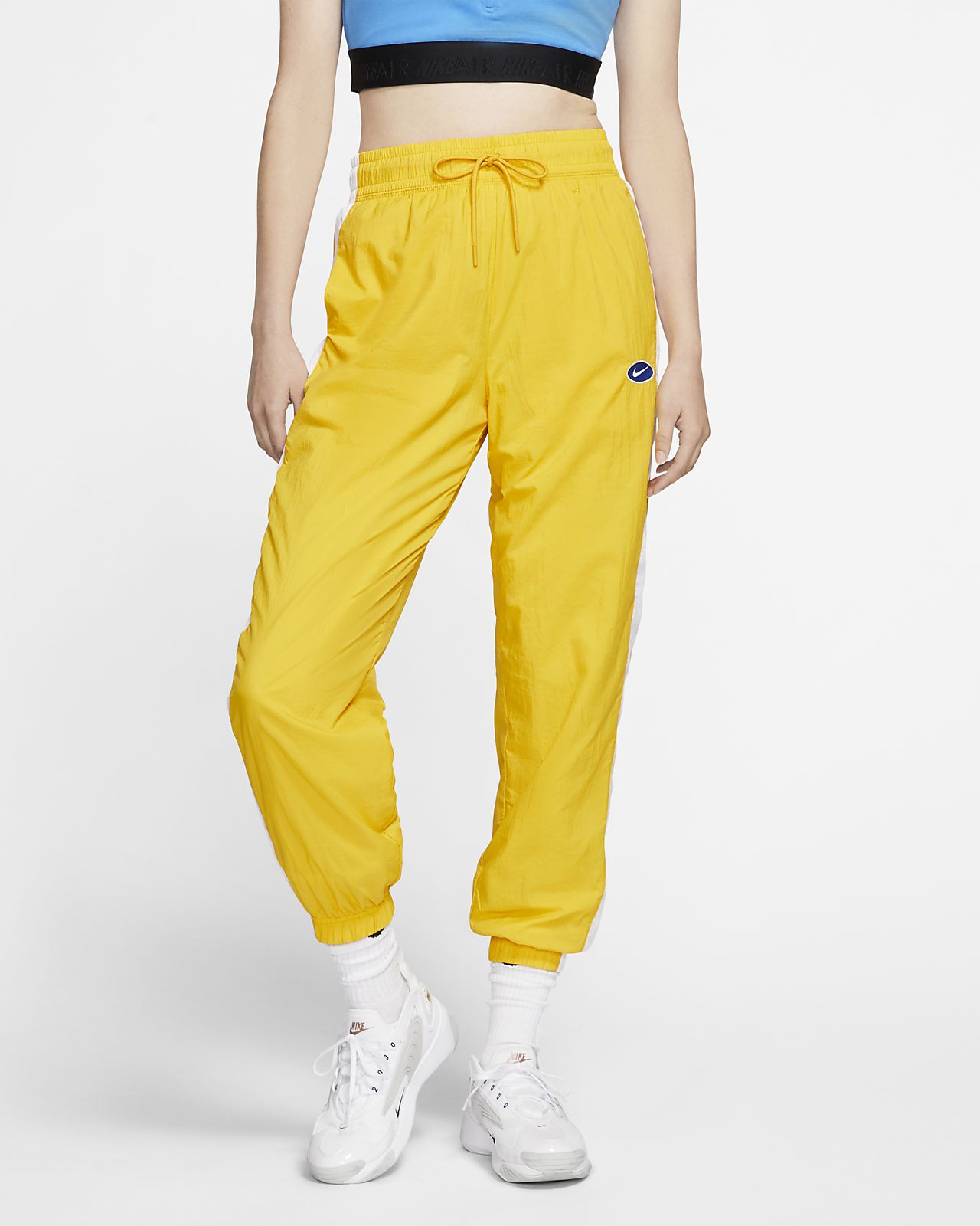 nike woven swoosh pants