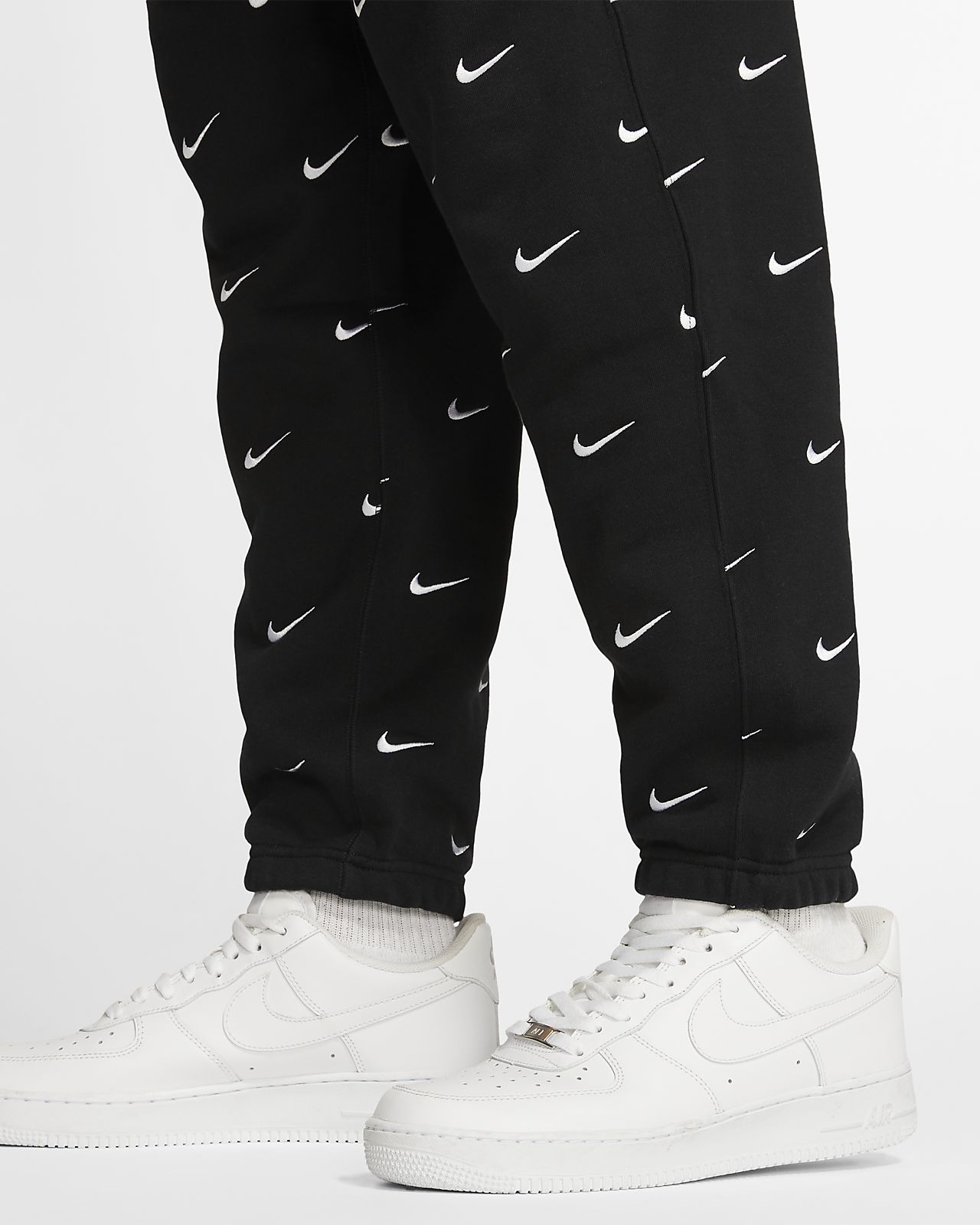 nike swoosh trousers