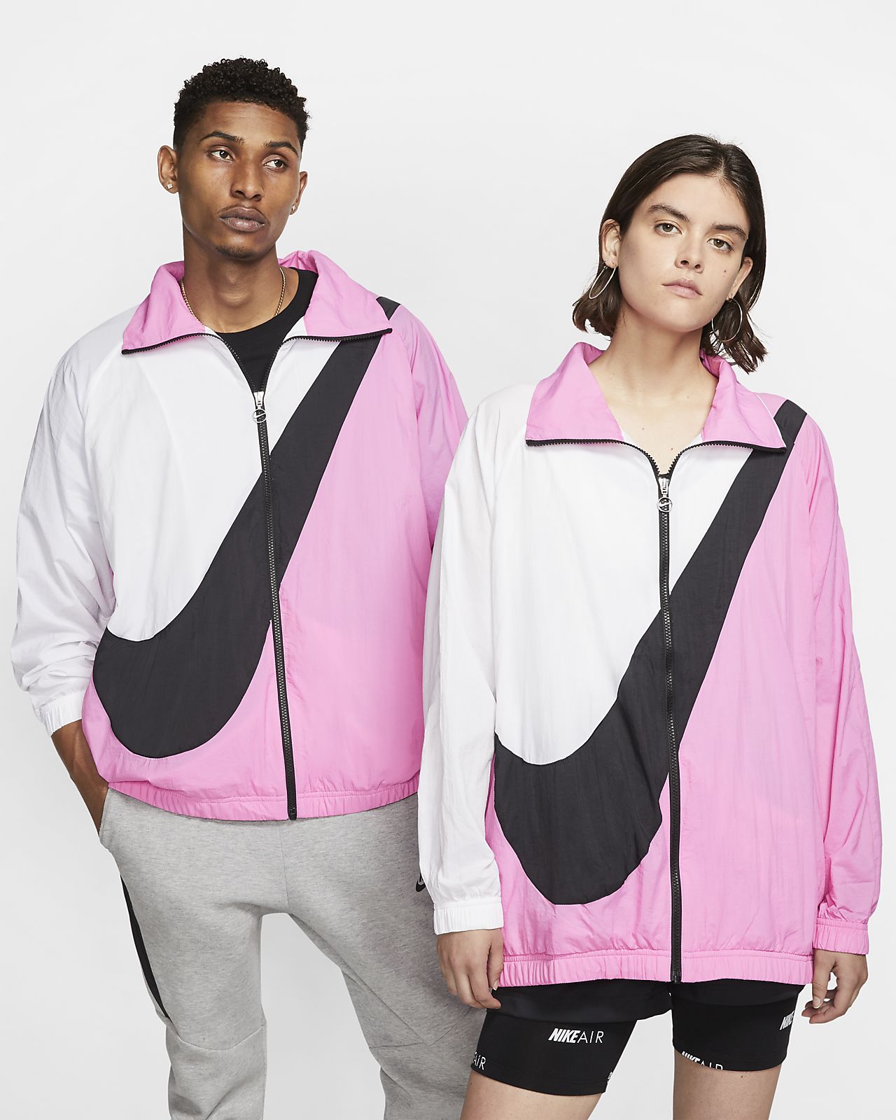 veste nike rose et blanche