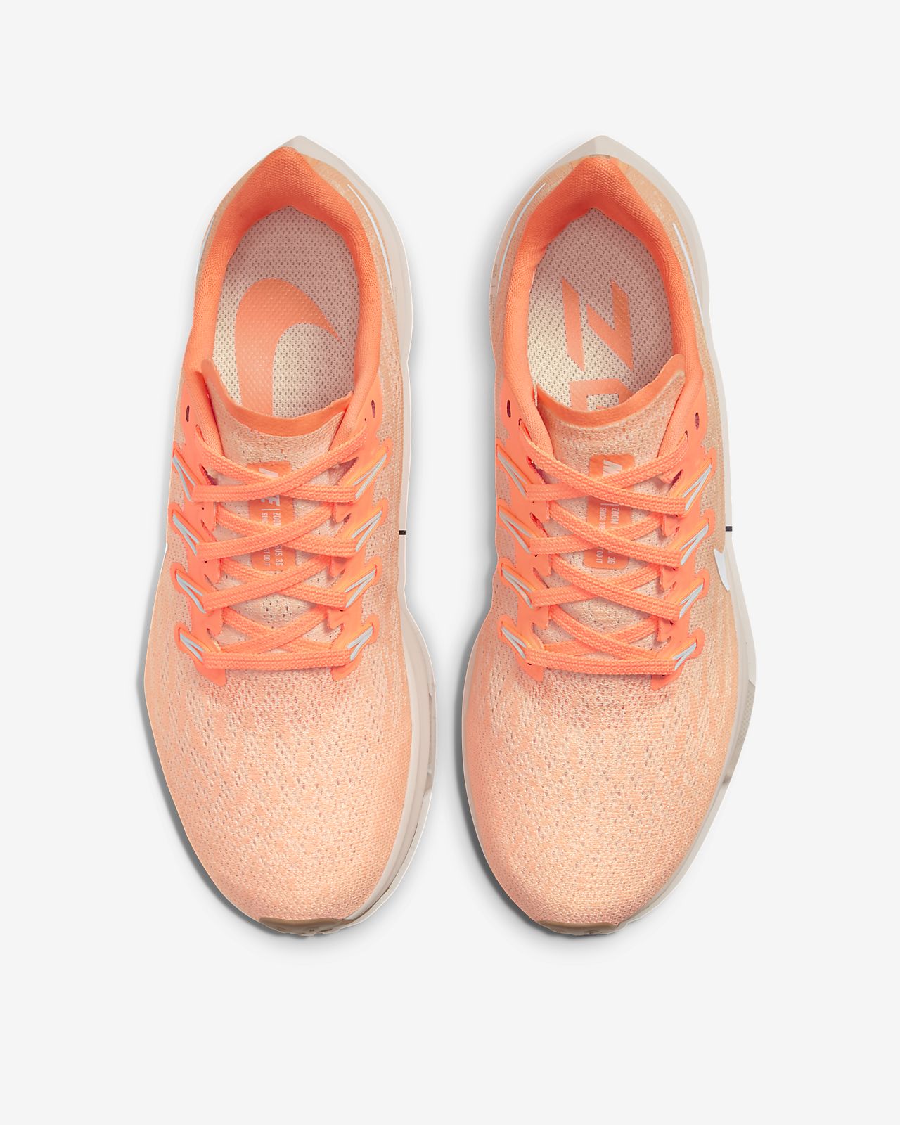 peach nike running shoes
