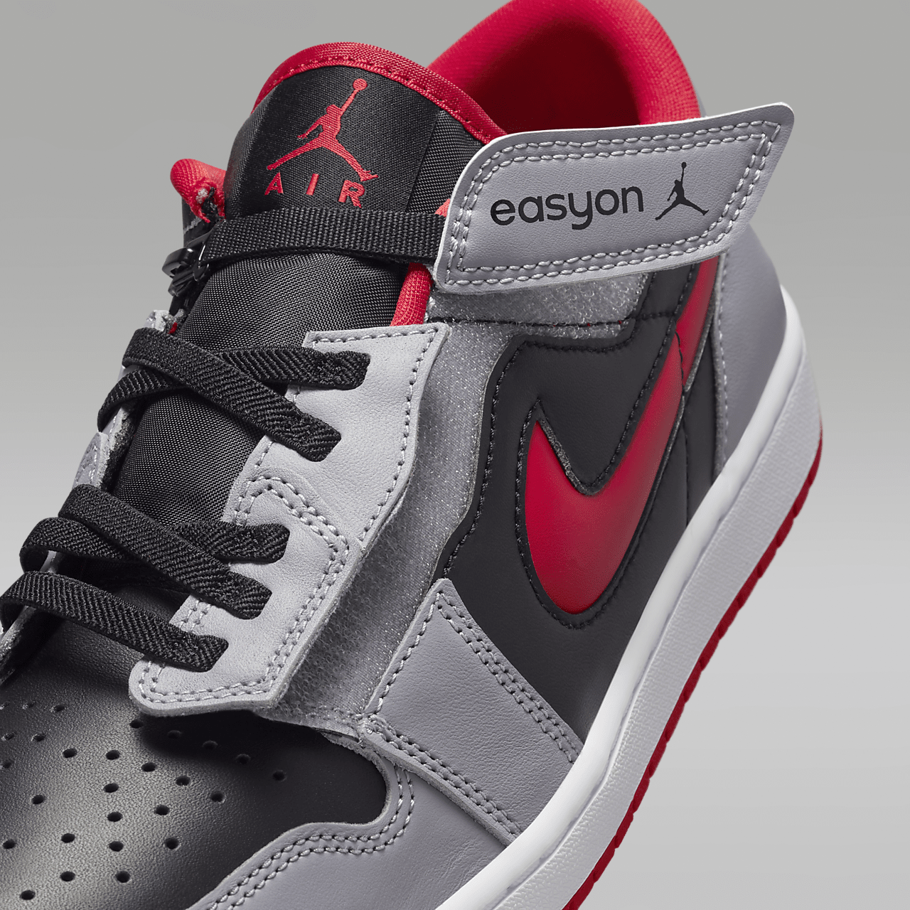 Nike Air Jordan 1 Low sneaker Zwart/Cement Grey/Wit/Fire Red