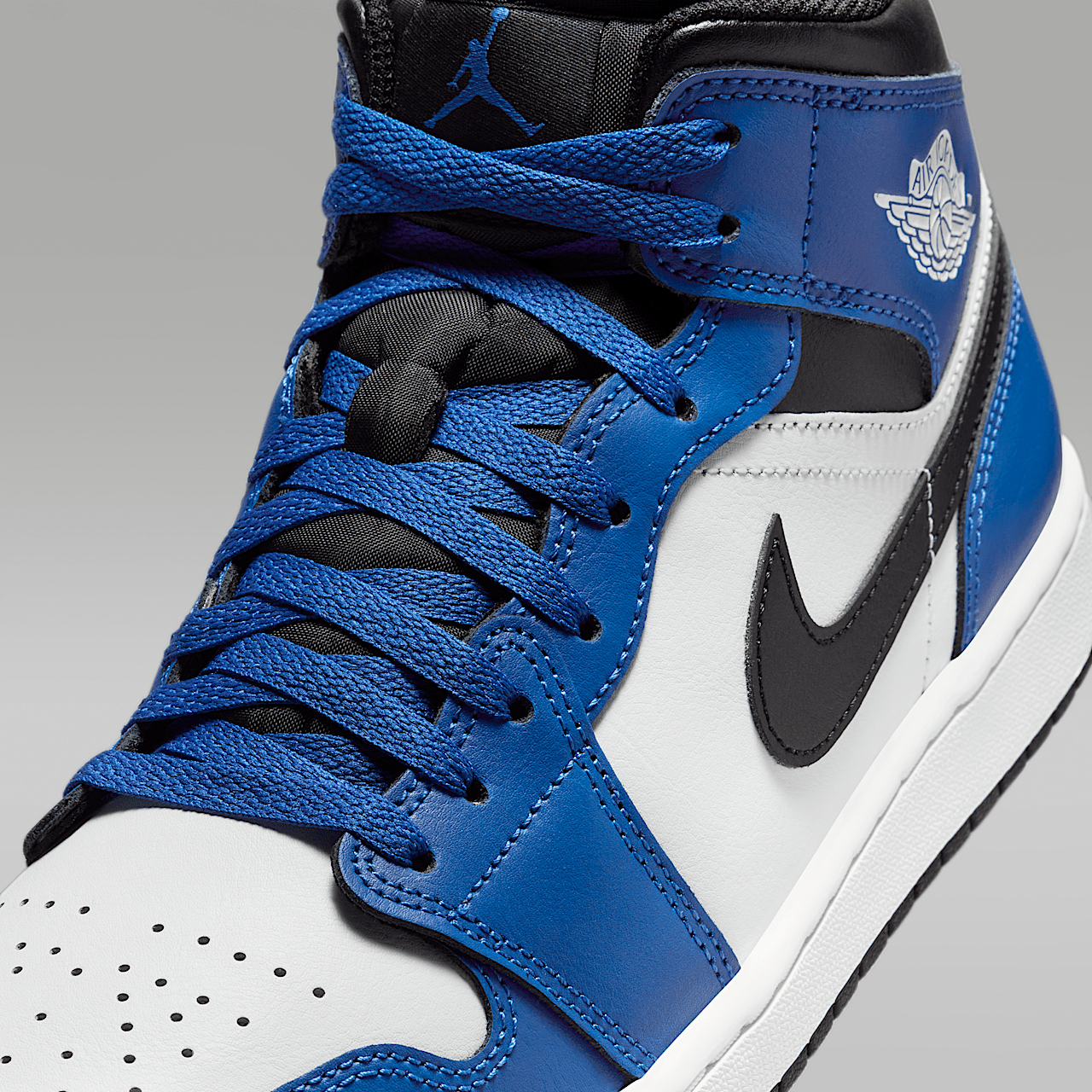 Nike Air Jordan 1 Mid sneaker Game Royal/Wit/Zwart