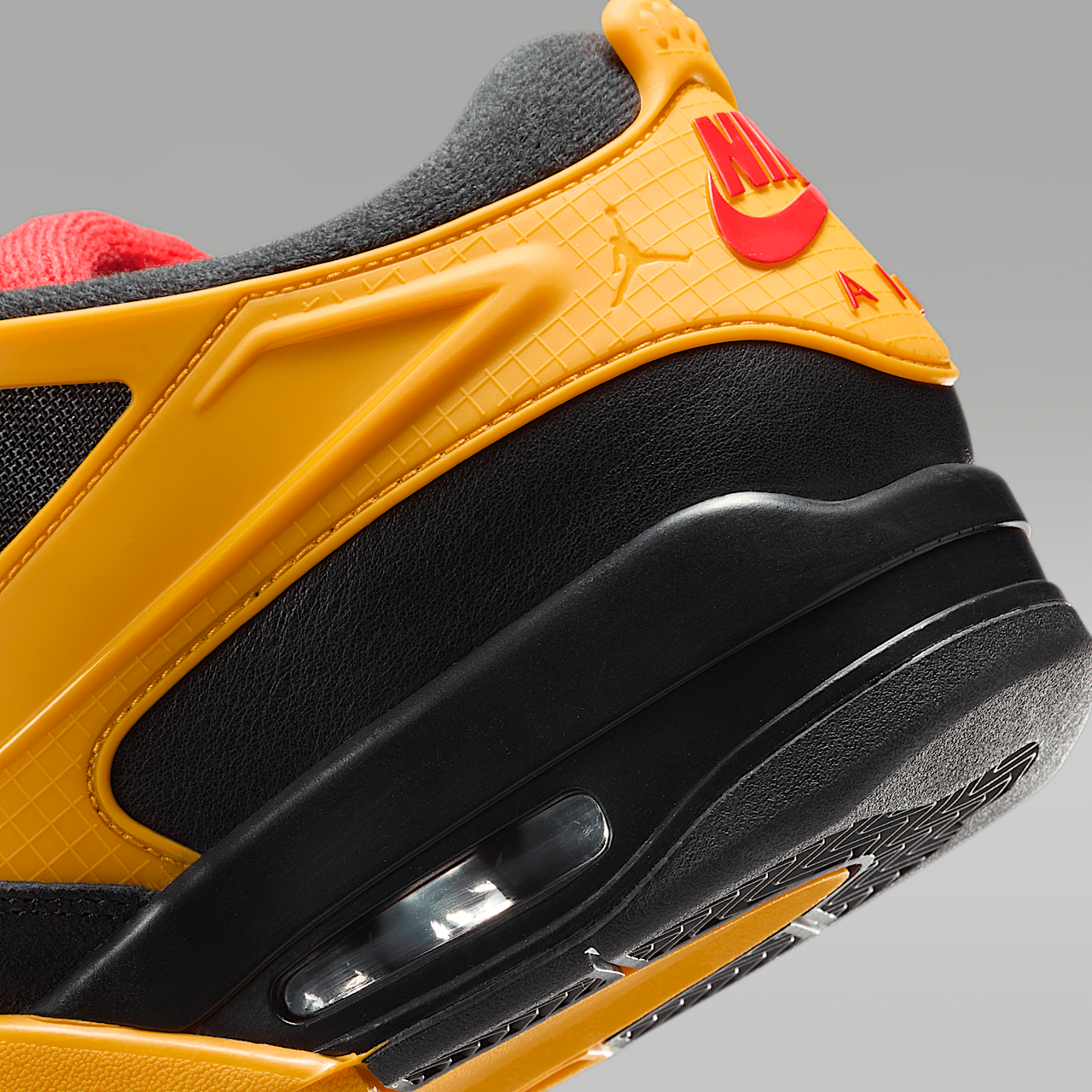 Nike Air Jordan 4 RM sneaker Zwart/Del Sol/Comet Red
