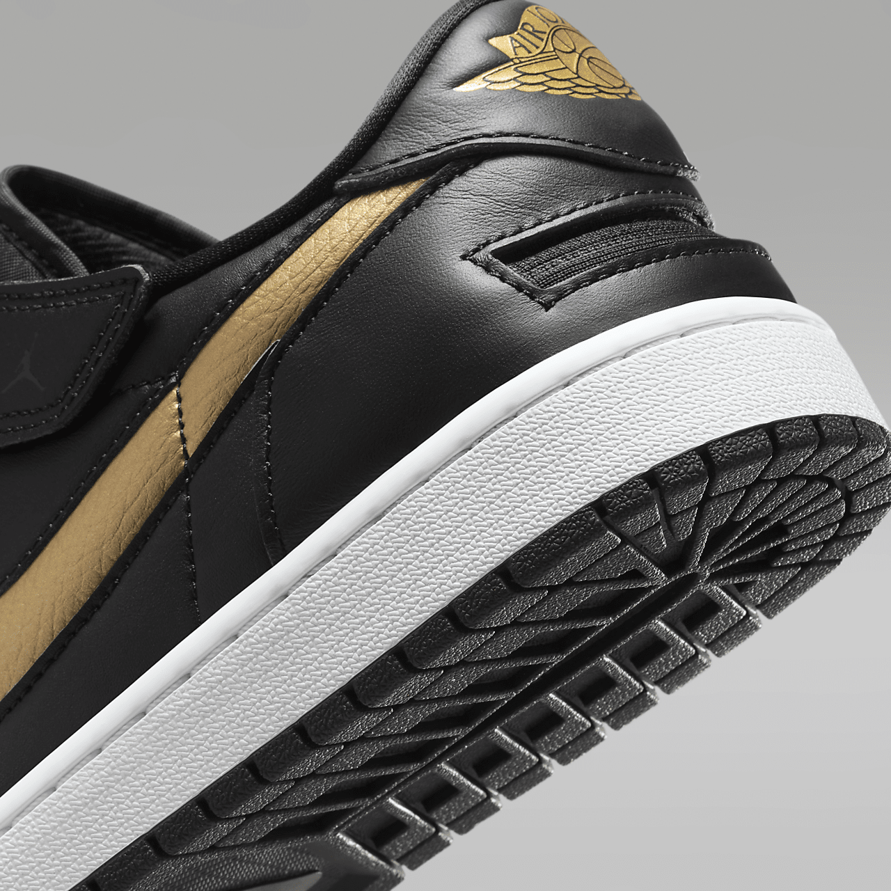 Nike Air Jordan 1 Low sneaker Zwart/Wit/Metallic Gold