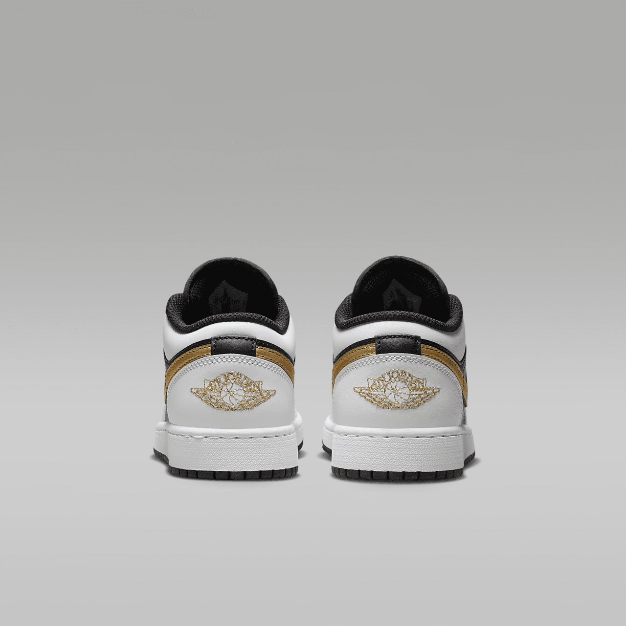 Nike Air Jordan 1 Low sneaker Wit/Zwart/Metallic Gold