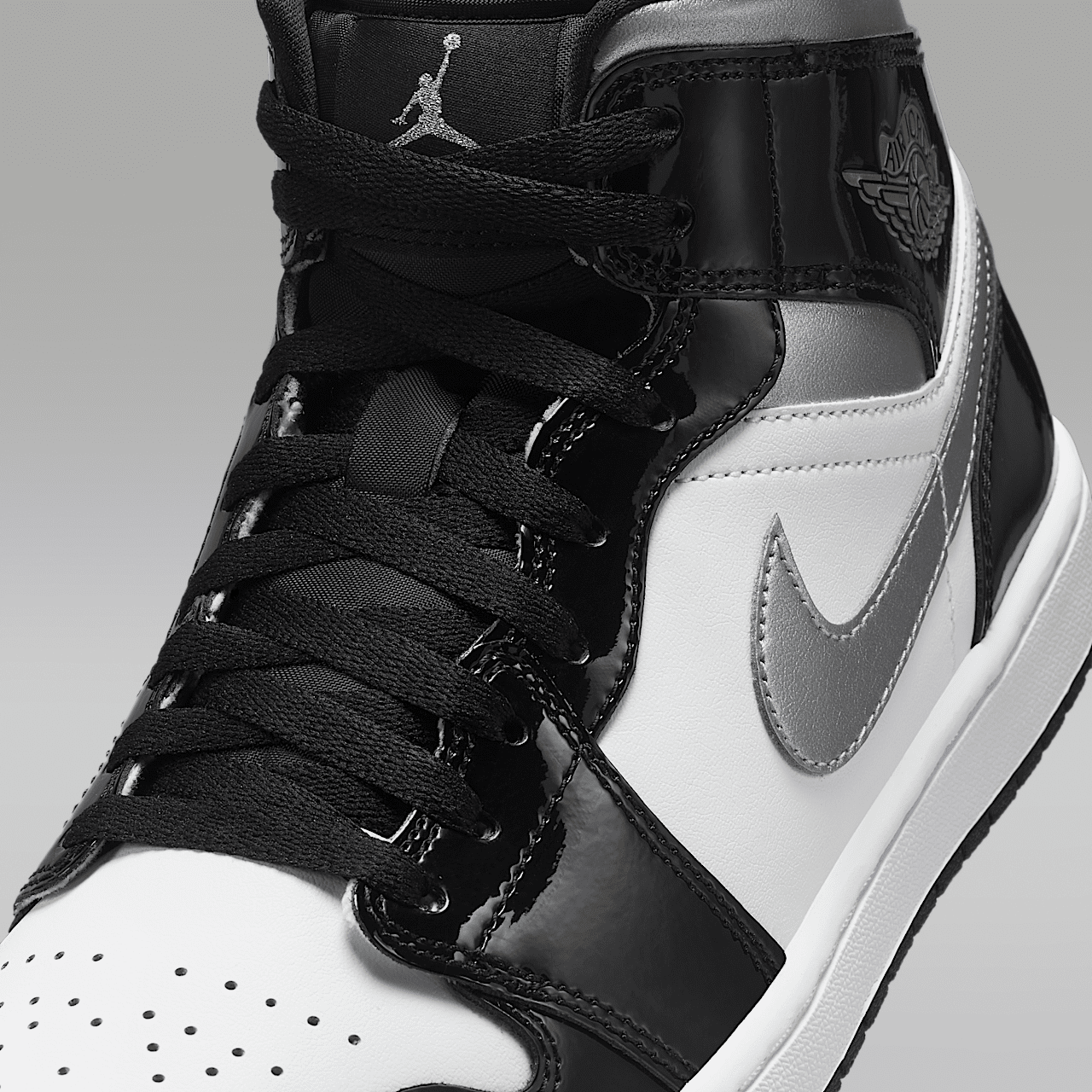 Nike Air Jordan 1 Mid sneaker Zwart/Wit/Metallic Gold/Metallic Silver