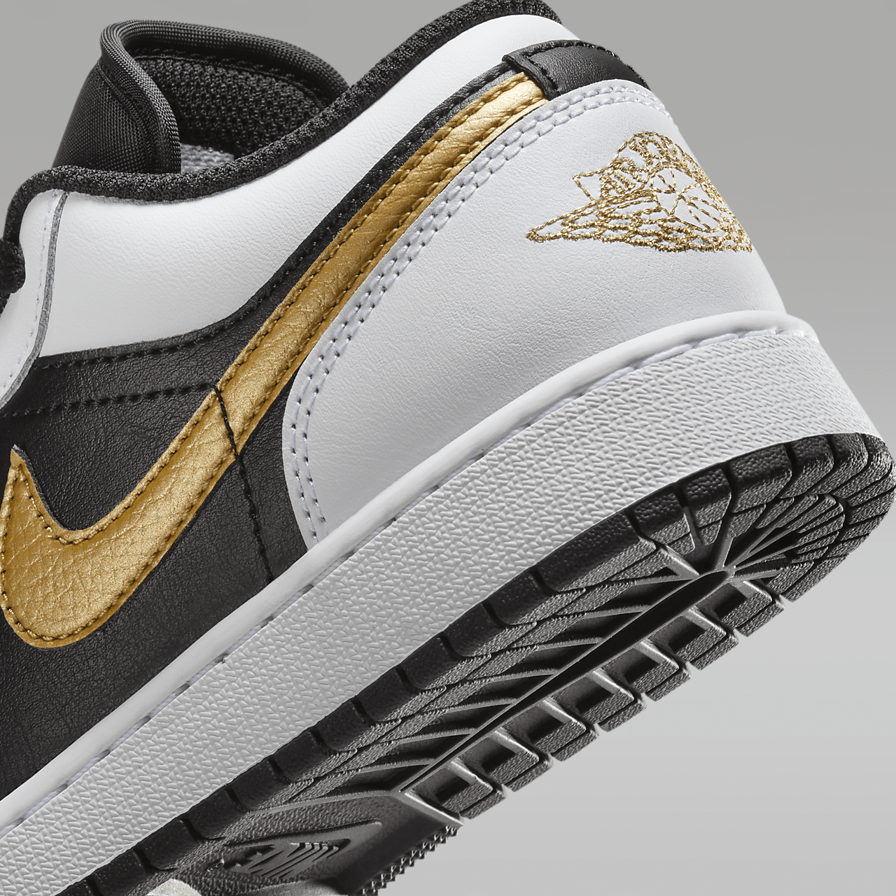 Nike Air Jordan 1 Low sneaker Wit/Zwart/Metallic Gold