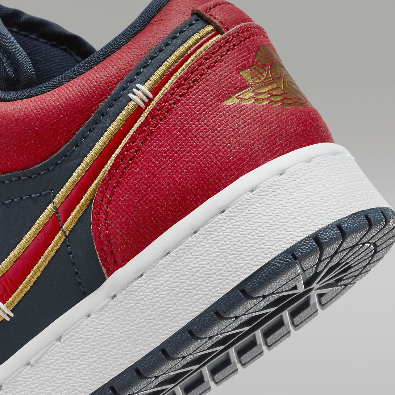 Nike Air Jordan 1 Low sneaker Armory Navy/Metallic Gold/Sport Red
