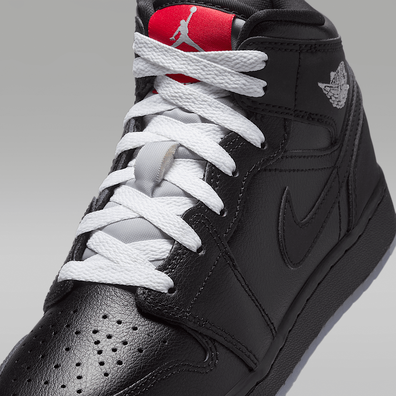 Nike Air Jordan 1 Mid sneaker Zwart/Wit/Wolf Grey/Zwart
