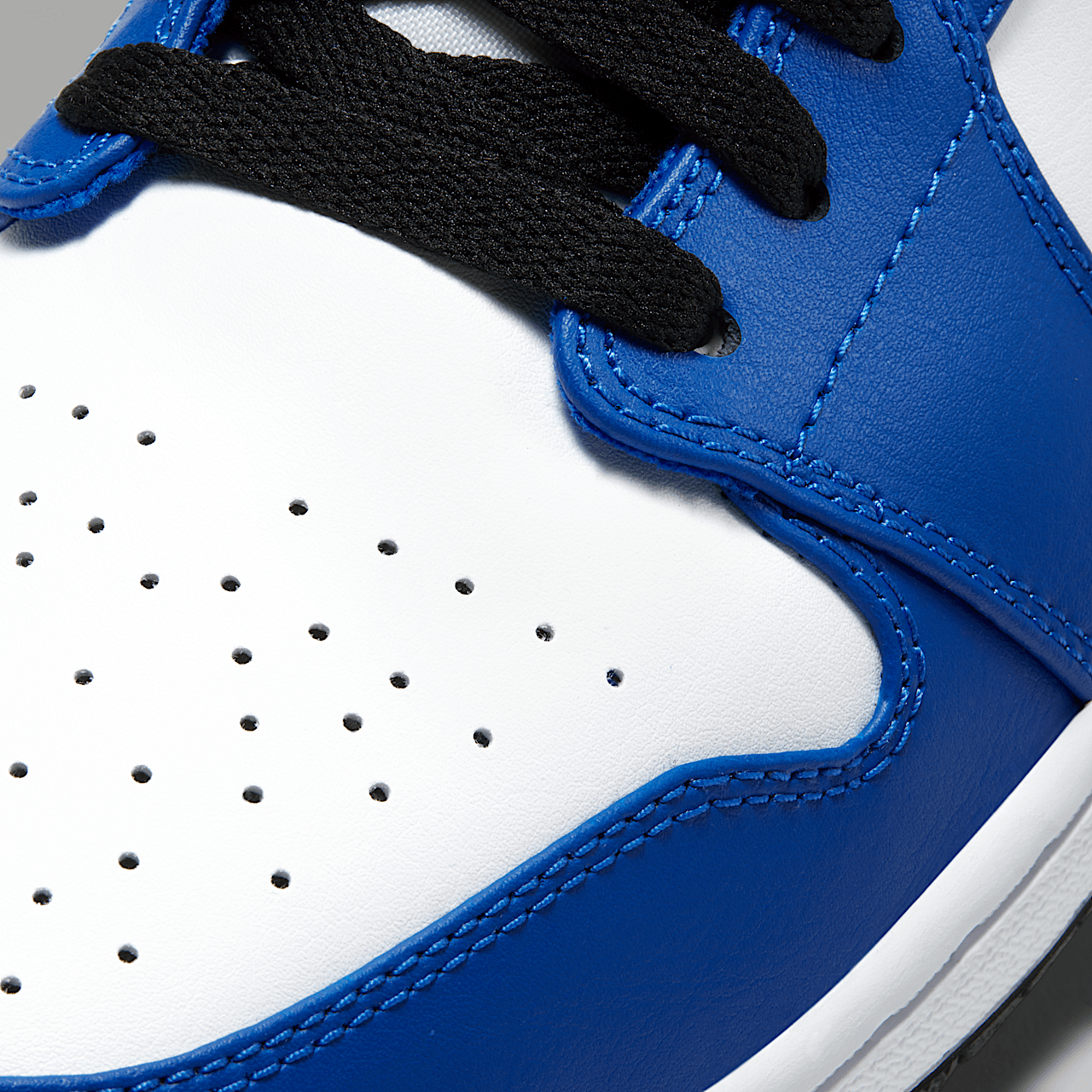 Nike Air Jordan 1 Low sneaker Wit/Zwart/Hyper Royal
