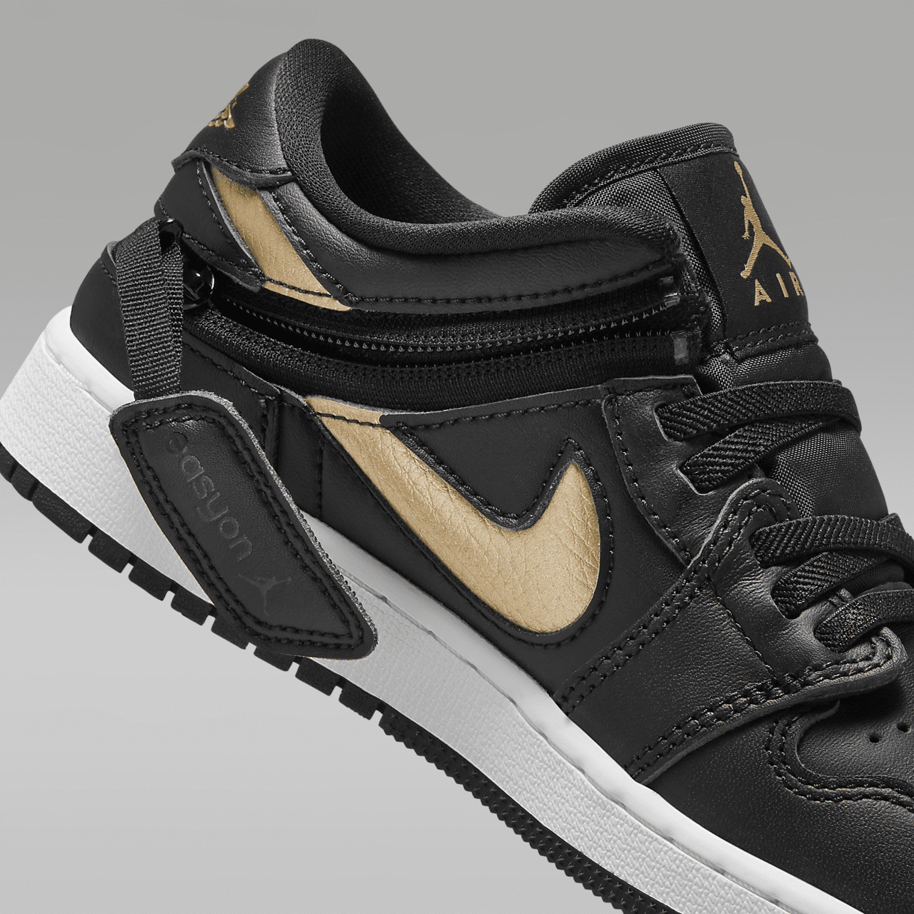 Nike Air Jordan 1 Low sneaker Zwart/Wit/Metallic Gold