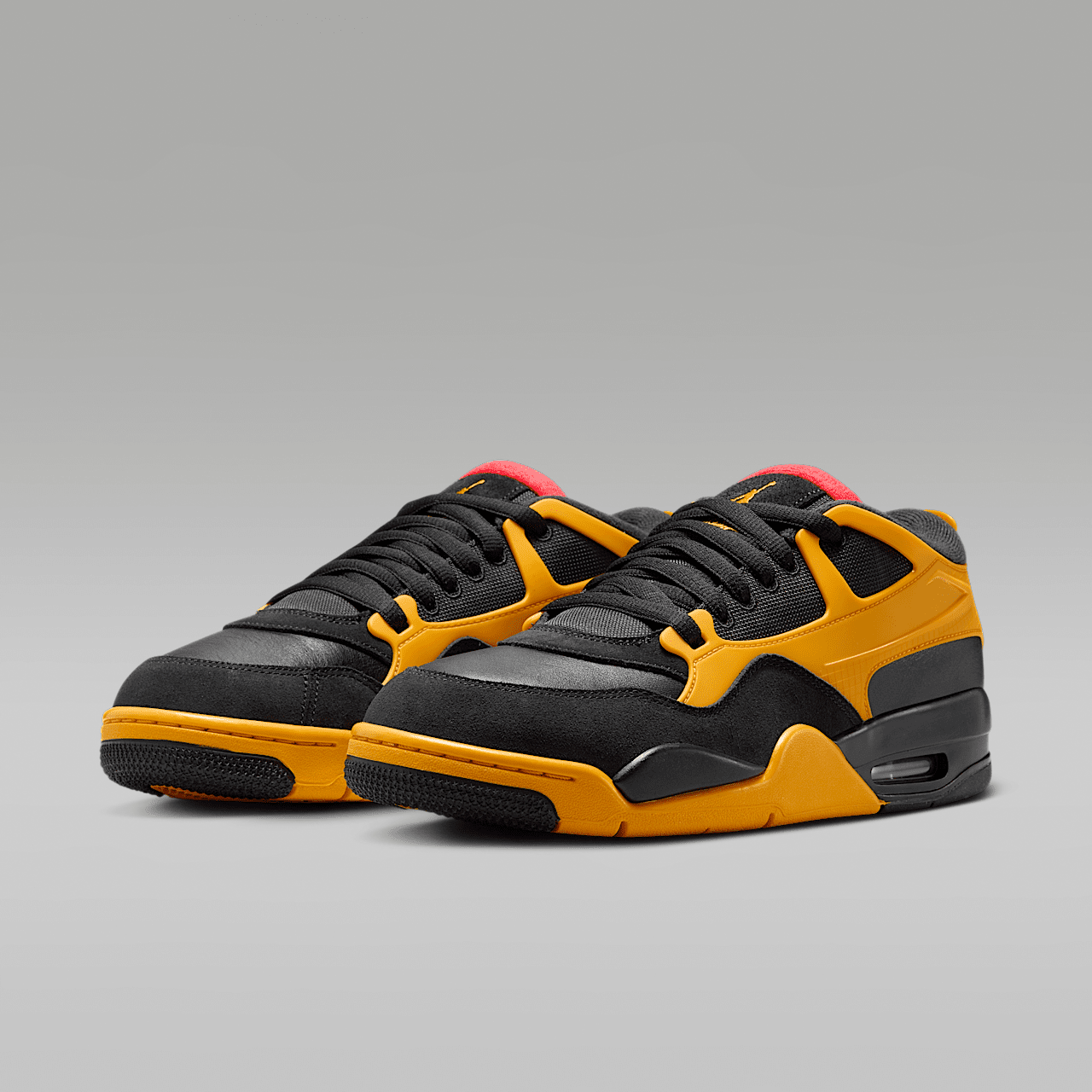 Nike Air Jordan 4 RM sneaker Zwart/Del Sol/Comet Red