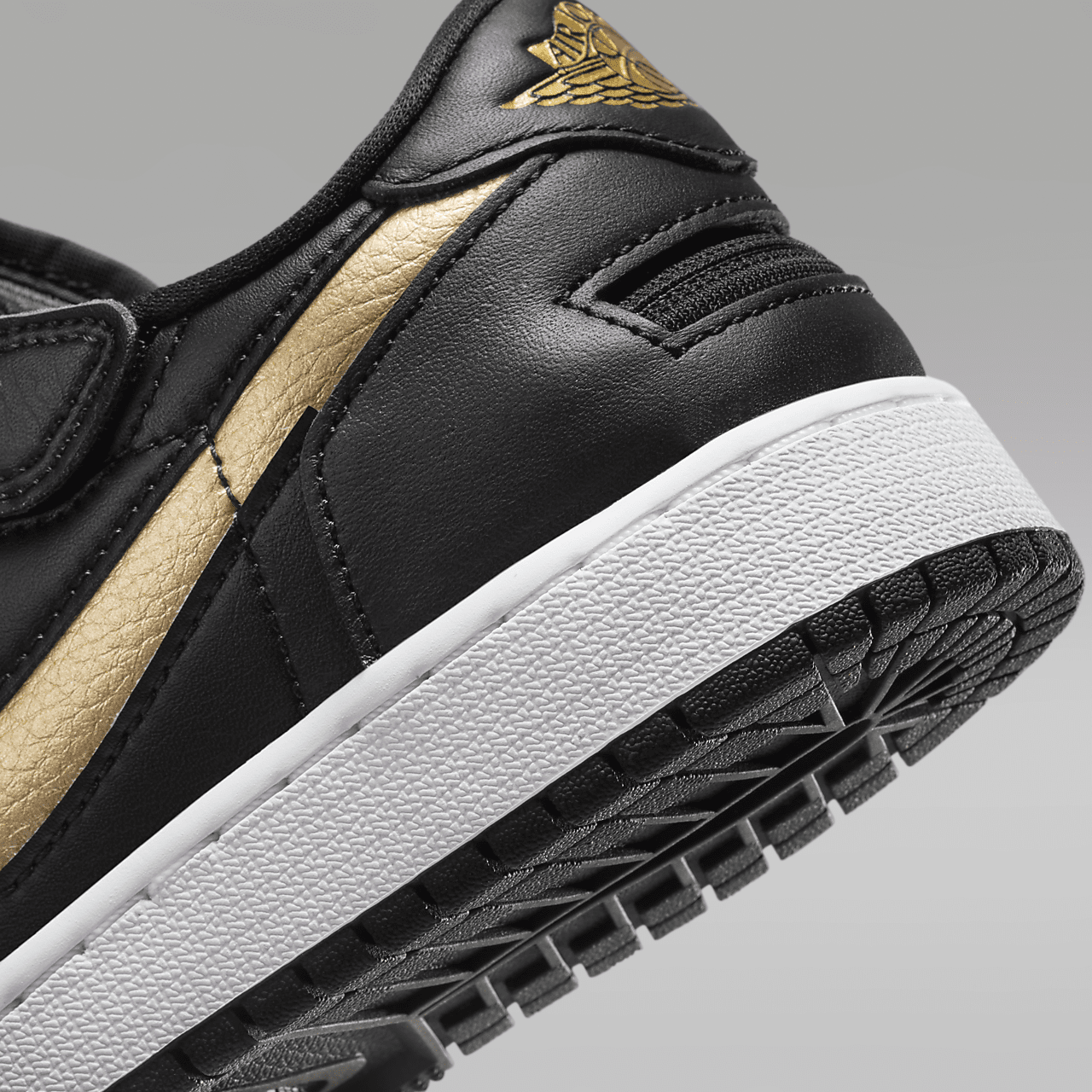 Nike Air Jordan 1 Low sneaker Zwart/Wit/Metallic Gold