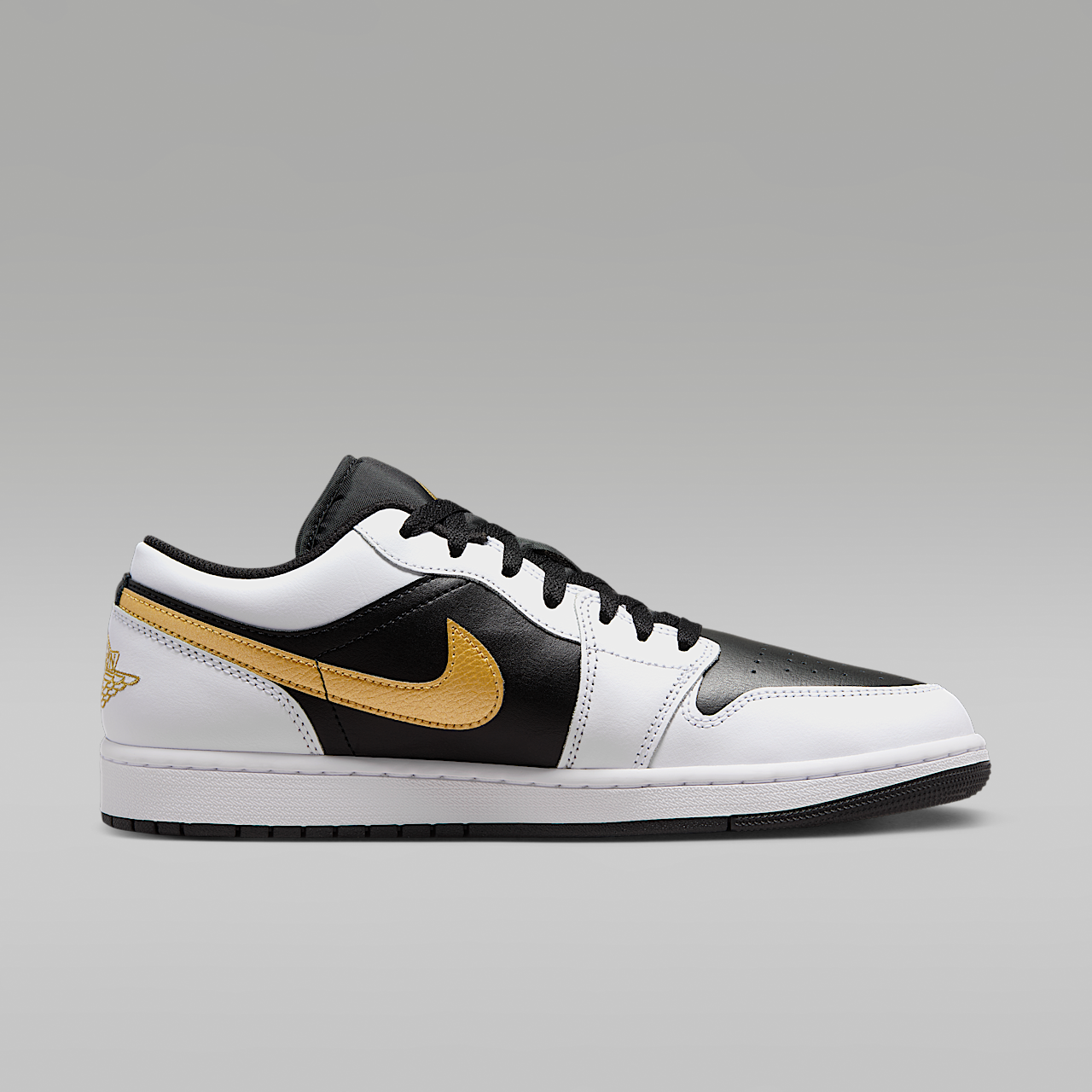 Nike Air Jordan 1 Low sneaker Wit/Zwart/Metallic Gold