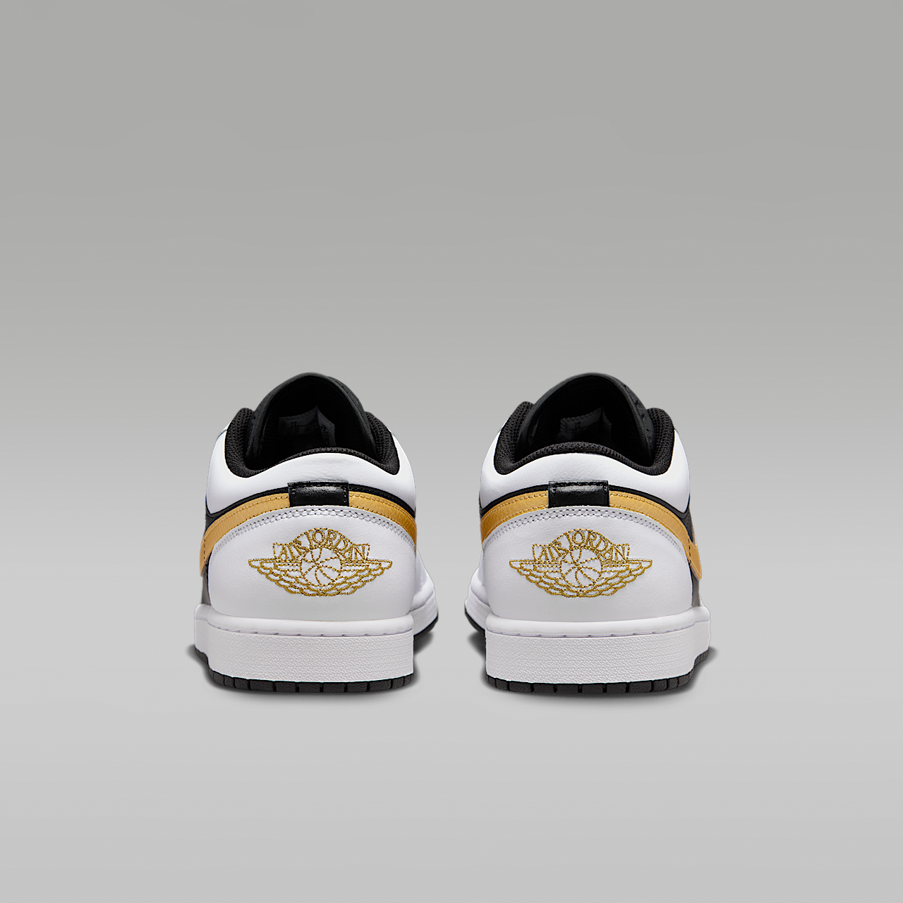 Nike Air Jordan 1 Low sneaker Wit/Zwart/Metallic Gold