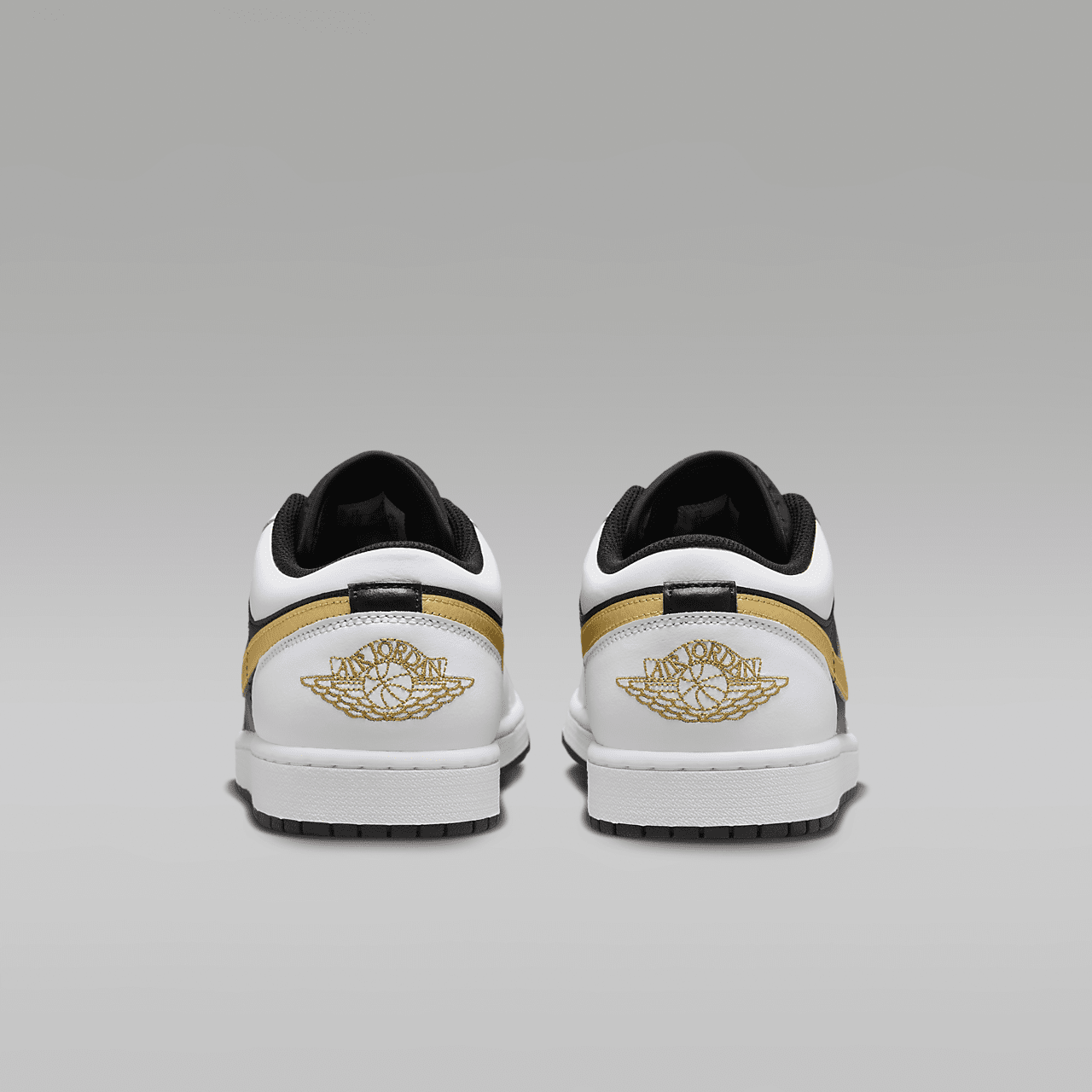 Nike Air Jordan 1 Low sneaker Wit/Zwart/Metallic Gold